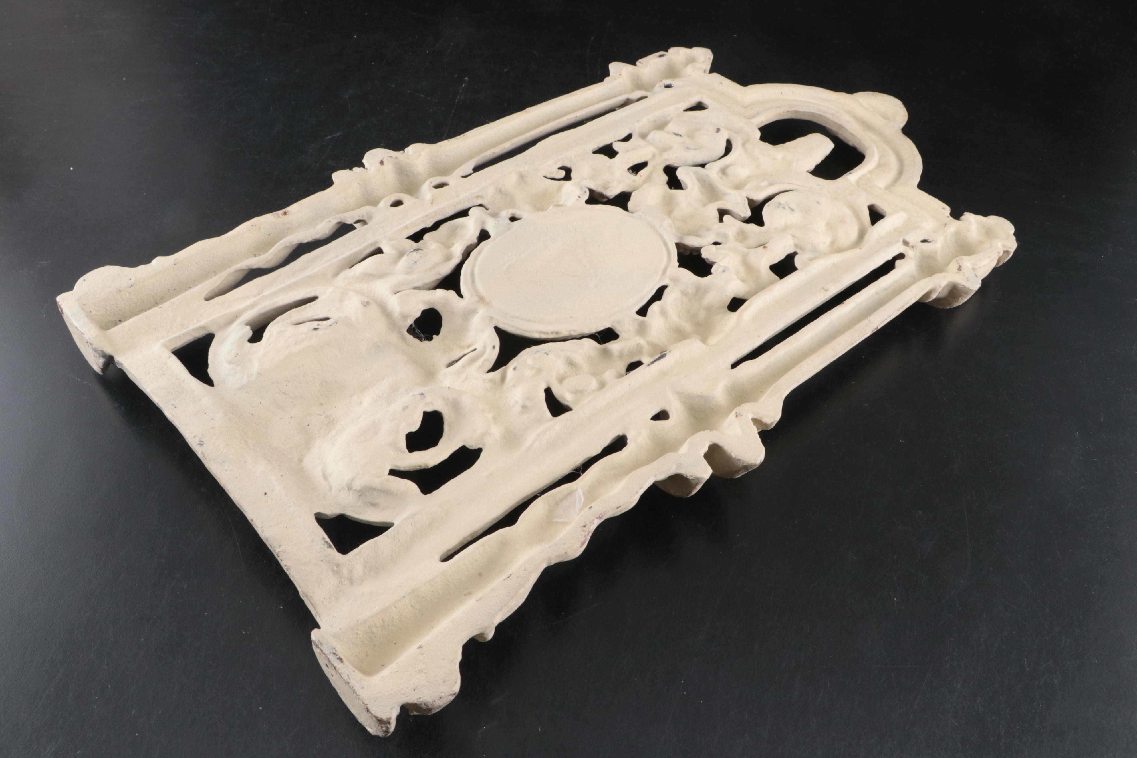 Baroque Style Cast Iron Wall Sculpture with Cherub Motif Cast Iron Wall Shelf