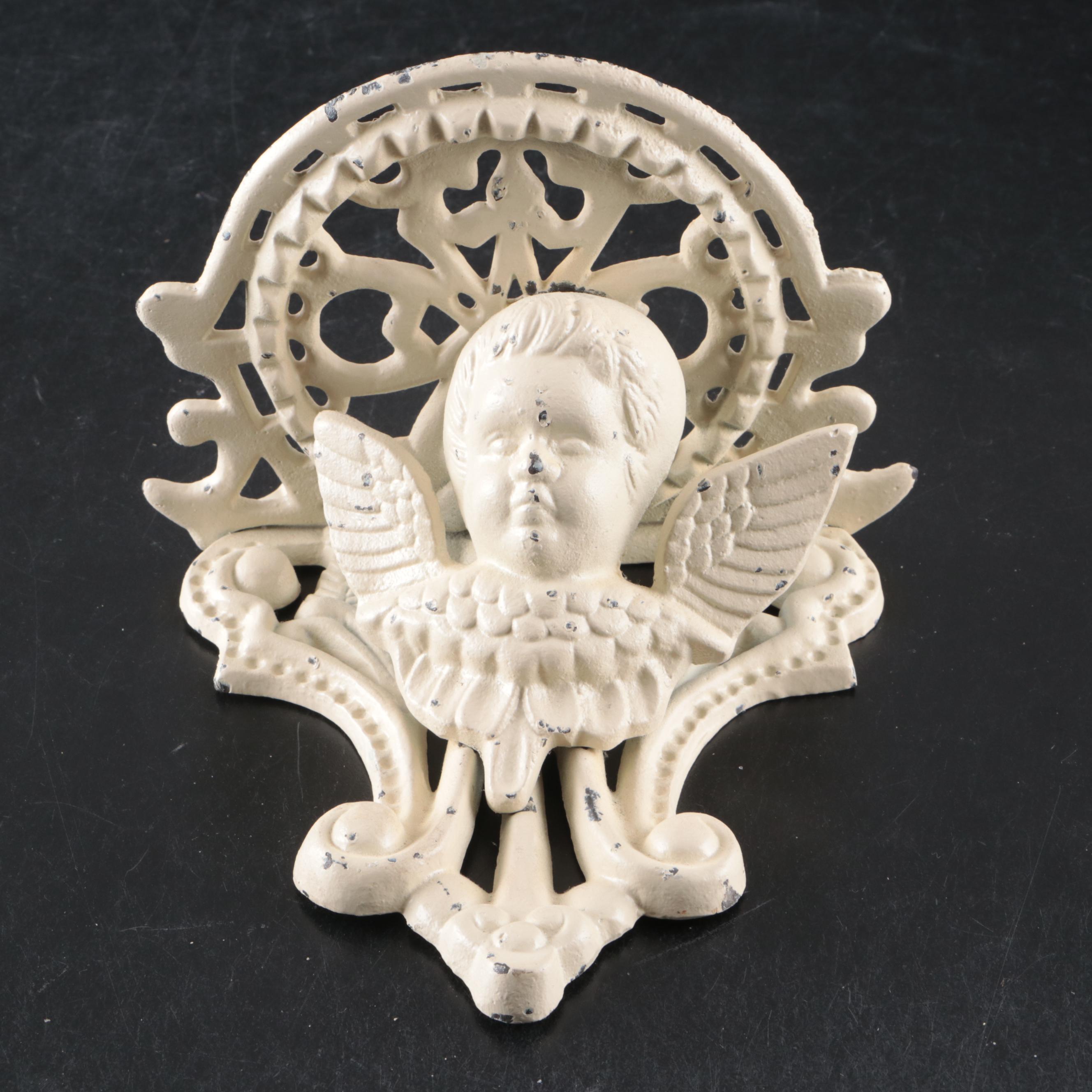 Baroque Style Cast Iron Wall Sculpture with Cherub Motif Cast Iron Wall Shelf