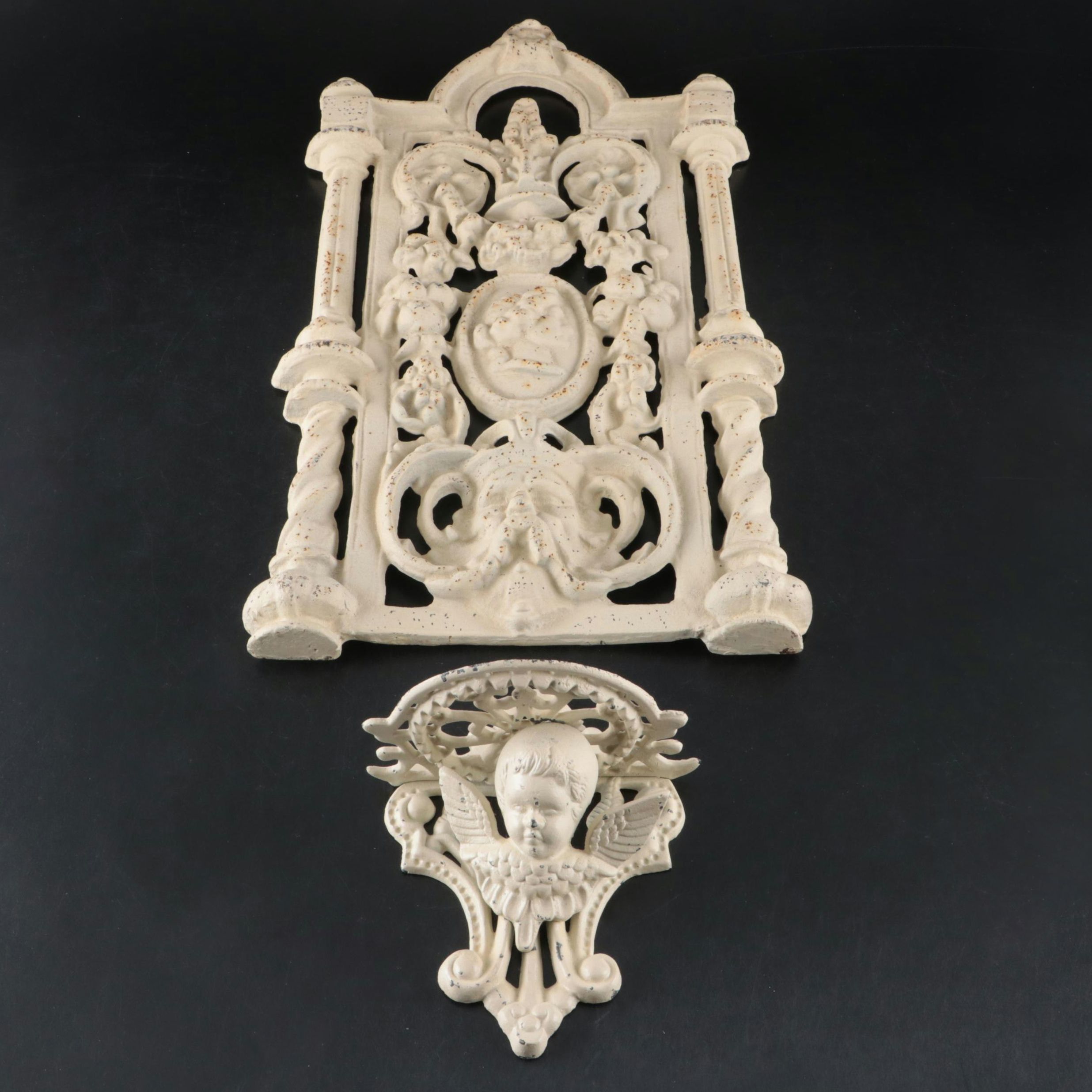 Baroque Style Cast Iron Wall Sculpture with Cherub Motif Cast Iron Wall Shelf