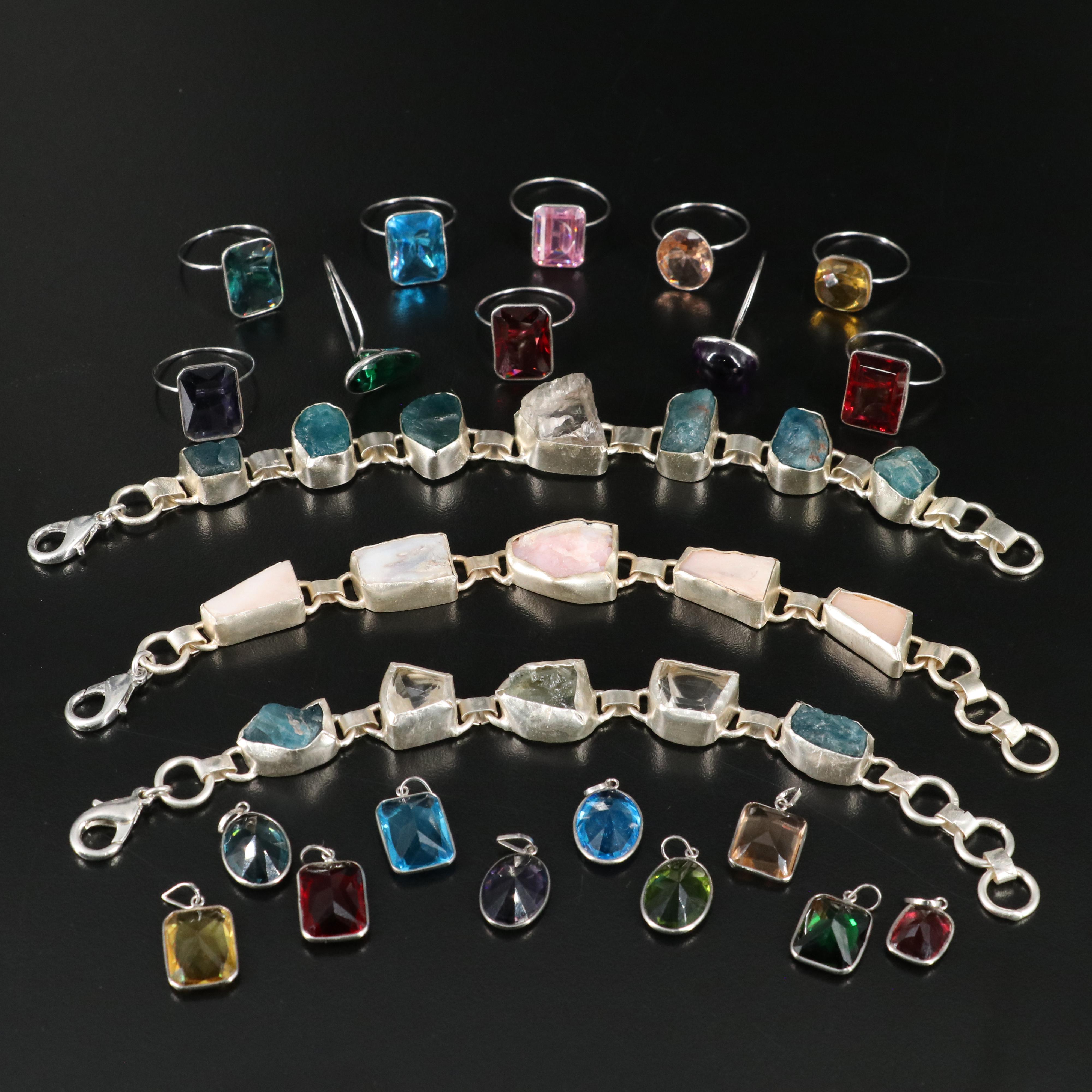 23 Silver Plated Bracelets, Rings, and Pendants