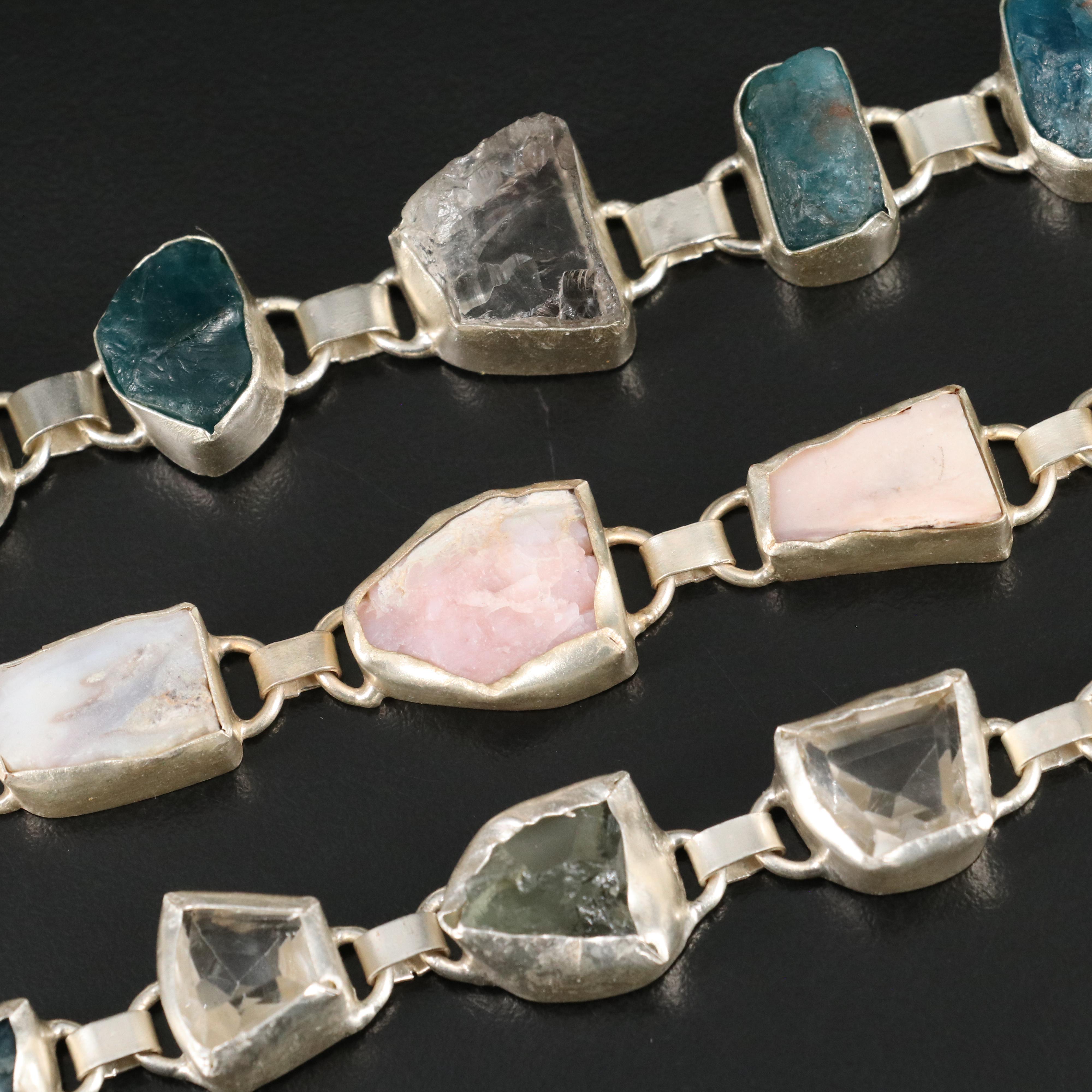 23 Silver Plated Bracelets, Rings, and Pendants