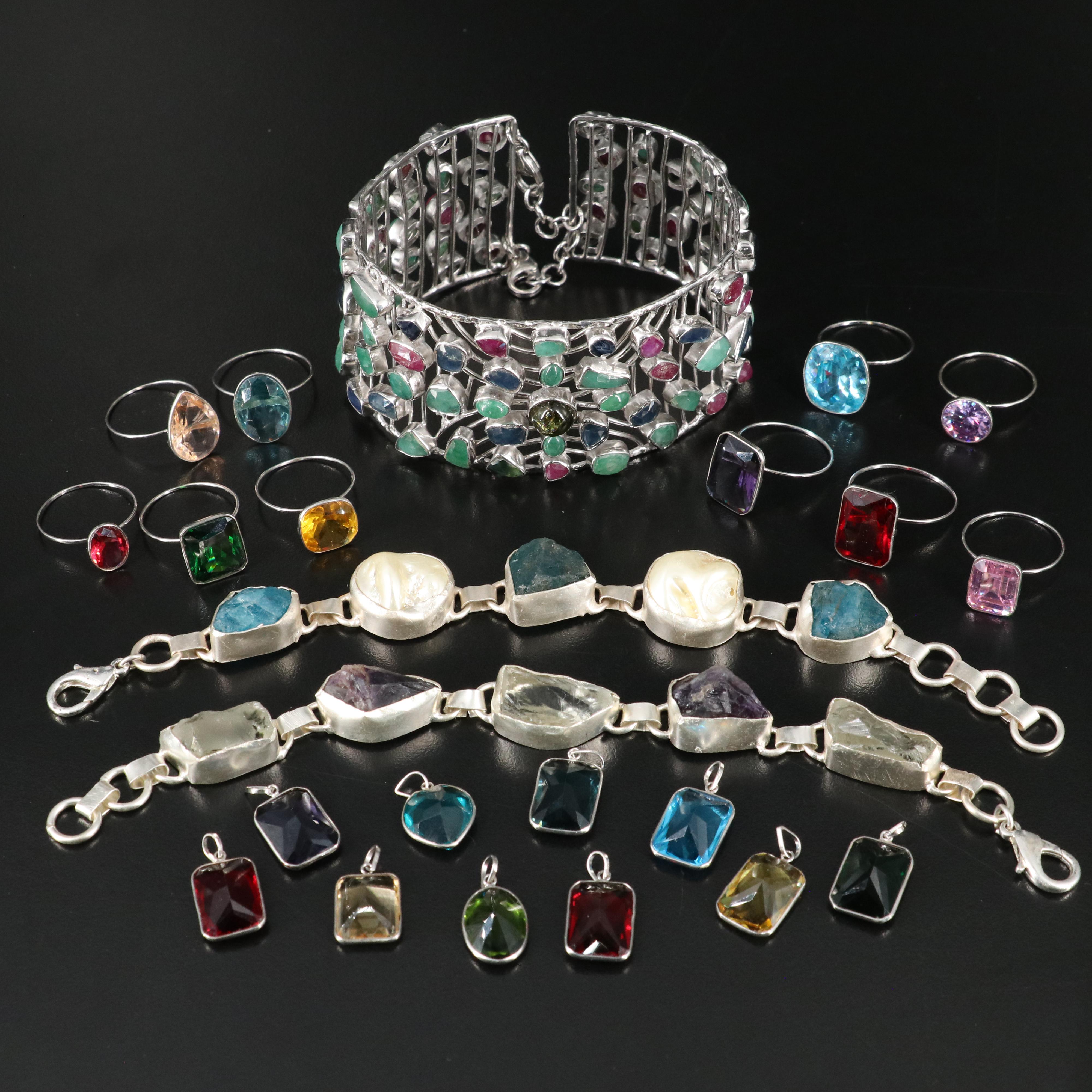 23 Silver Plated Bracelets, Rings, and Pendants