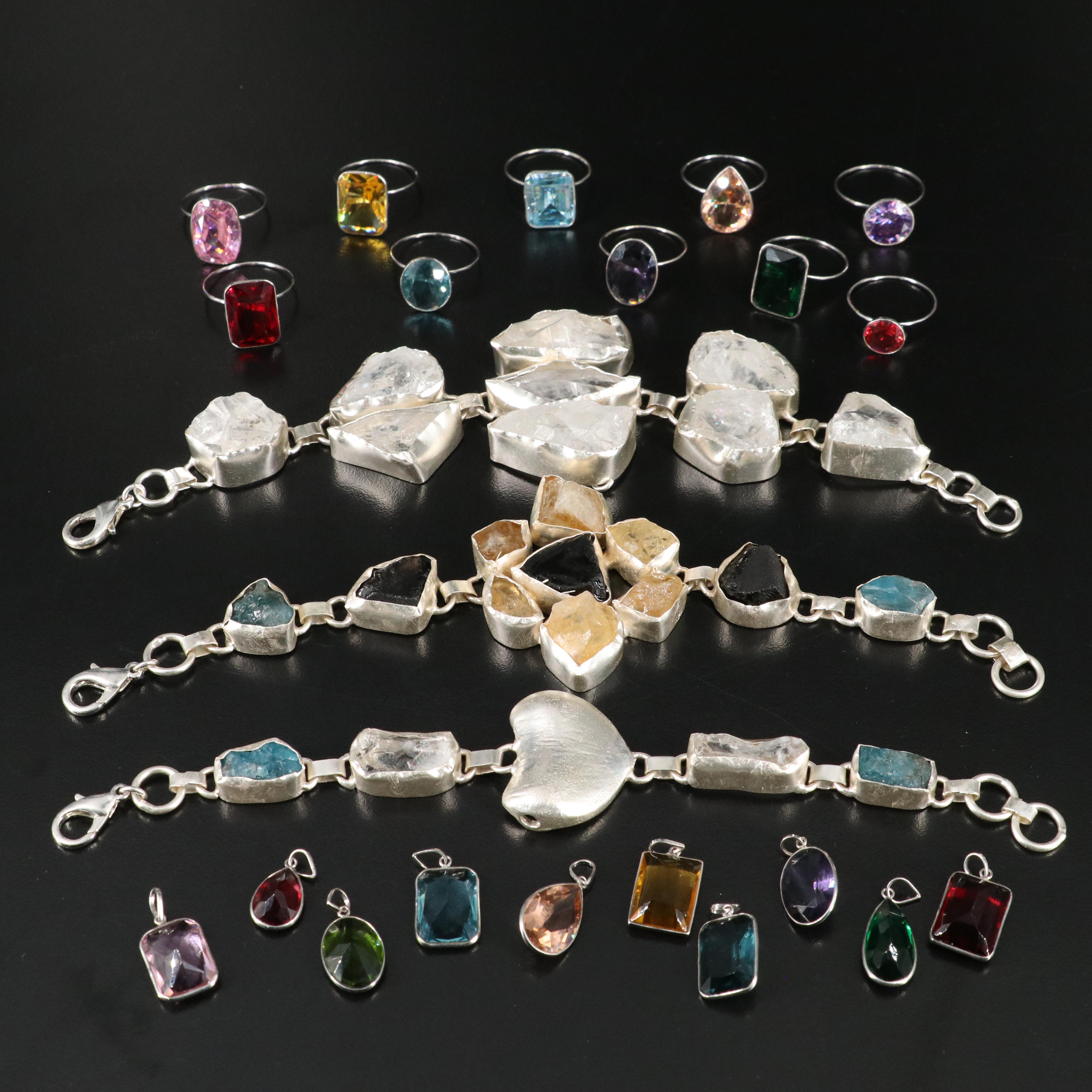 23 Silver Plated Bracelets, Rings, and Pendants