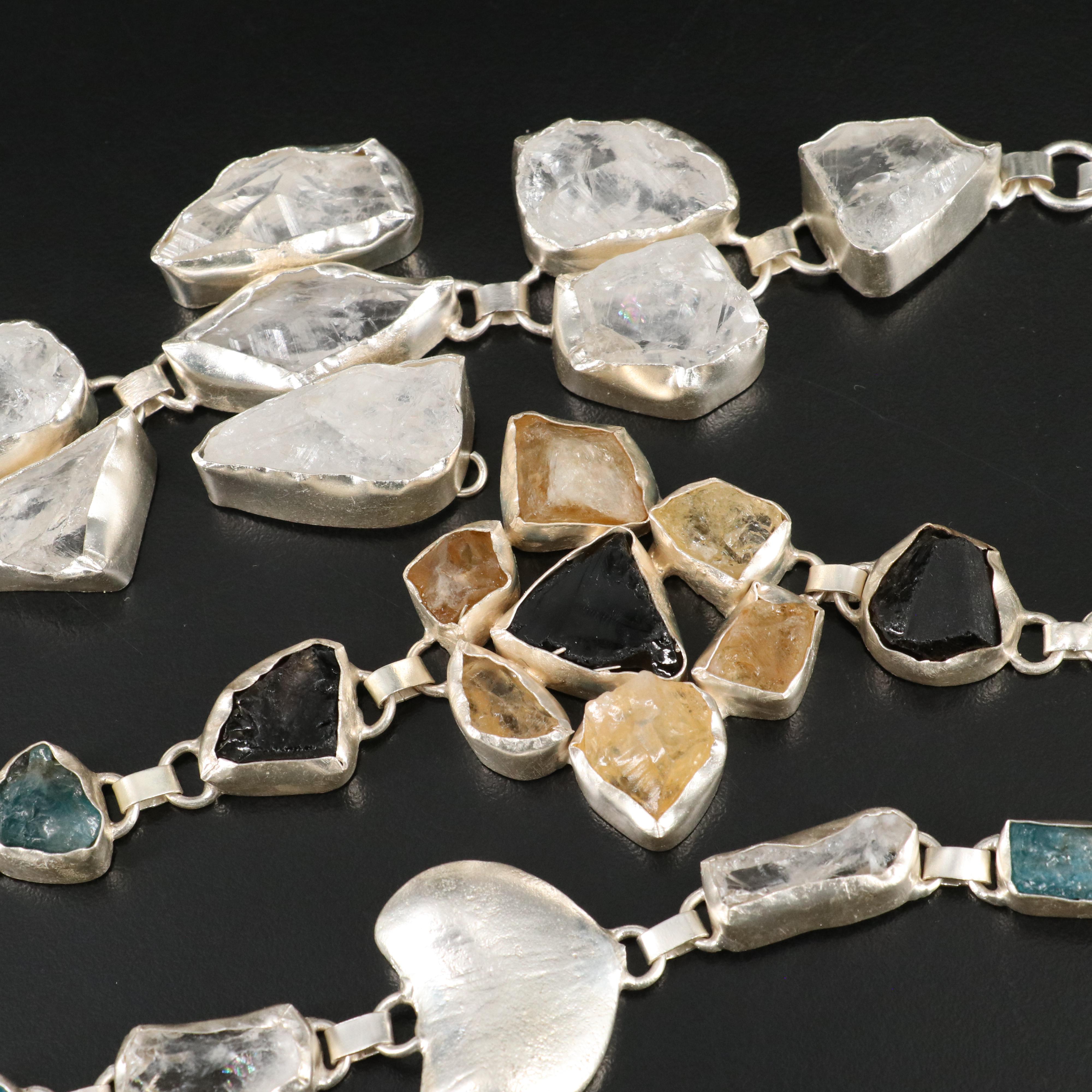 23 Silver Plated Bracelets, Rings, and Pendants