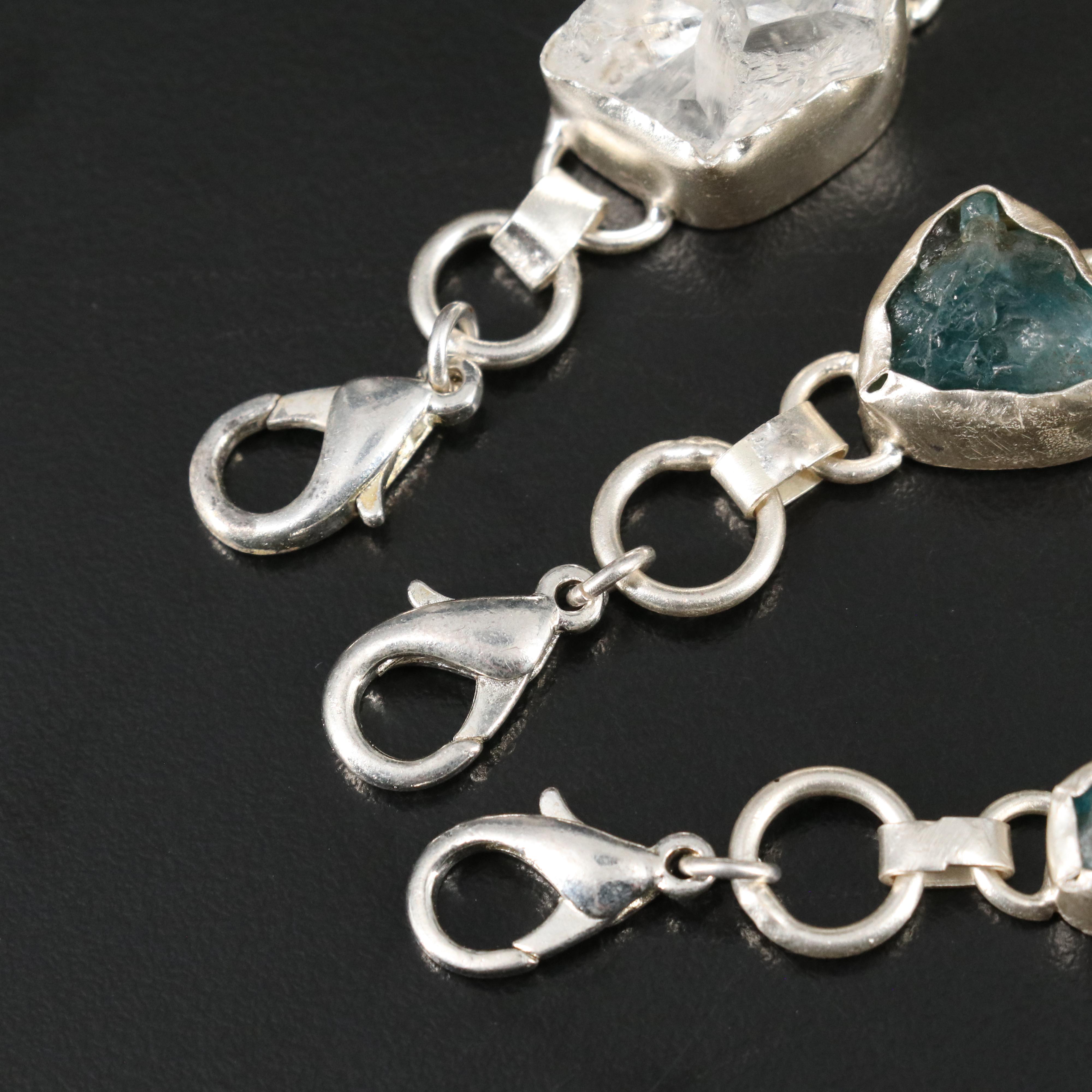 23 Silver Plated Bracelets, Rings, and Pendants