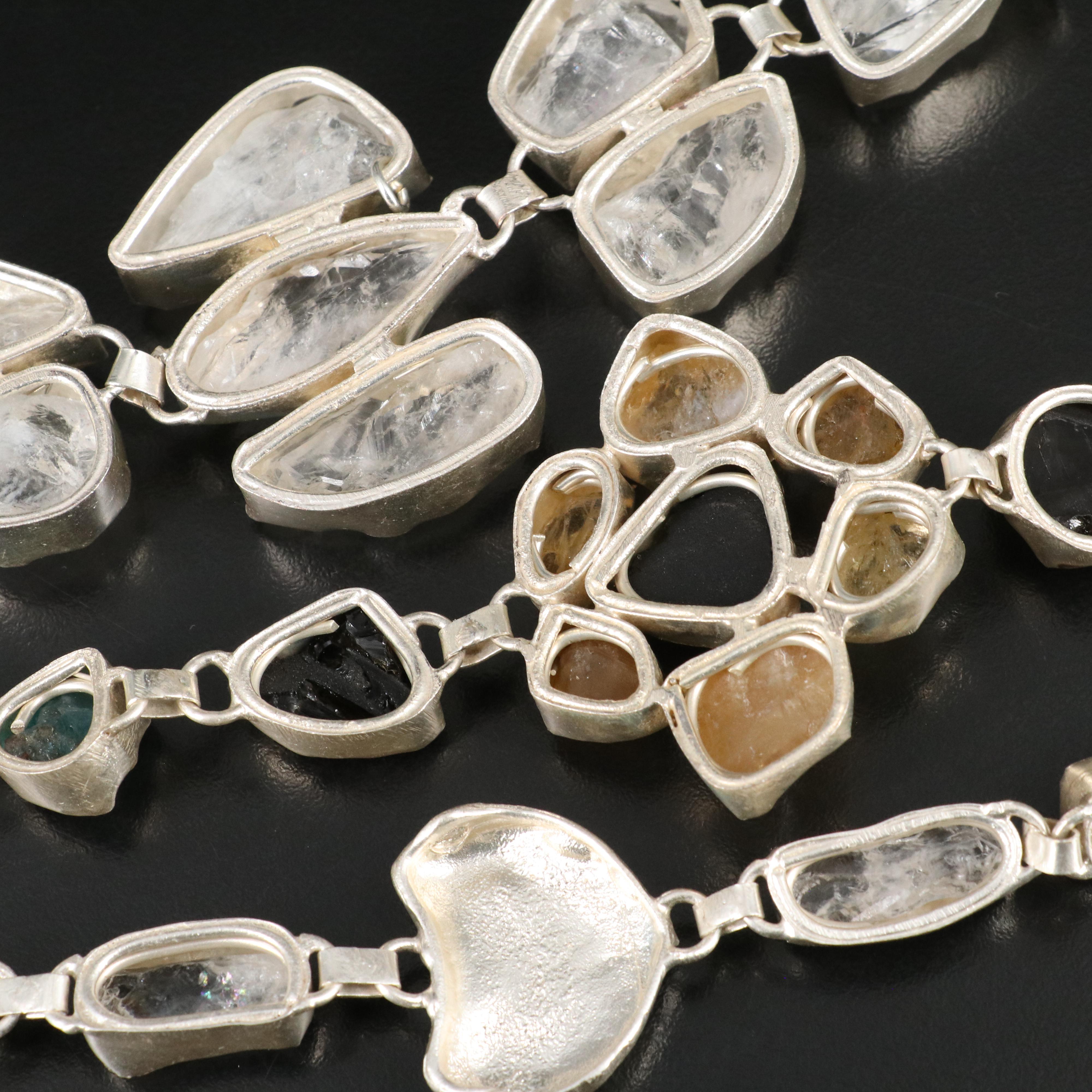 23 Silver Plated Bracelets, Rings, and Pendants