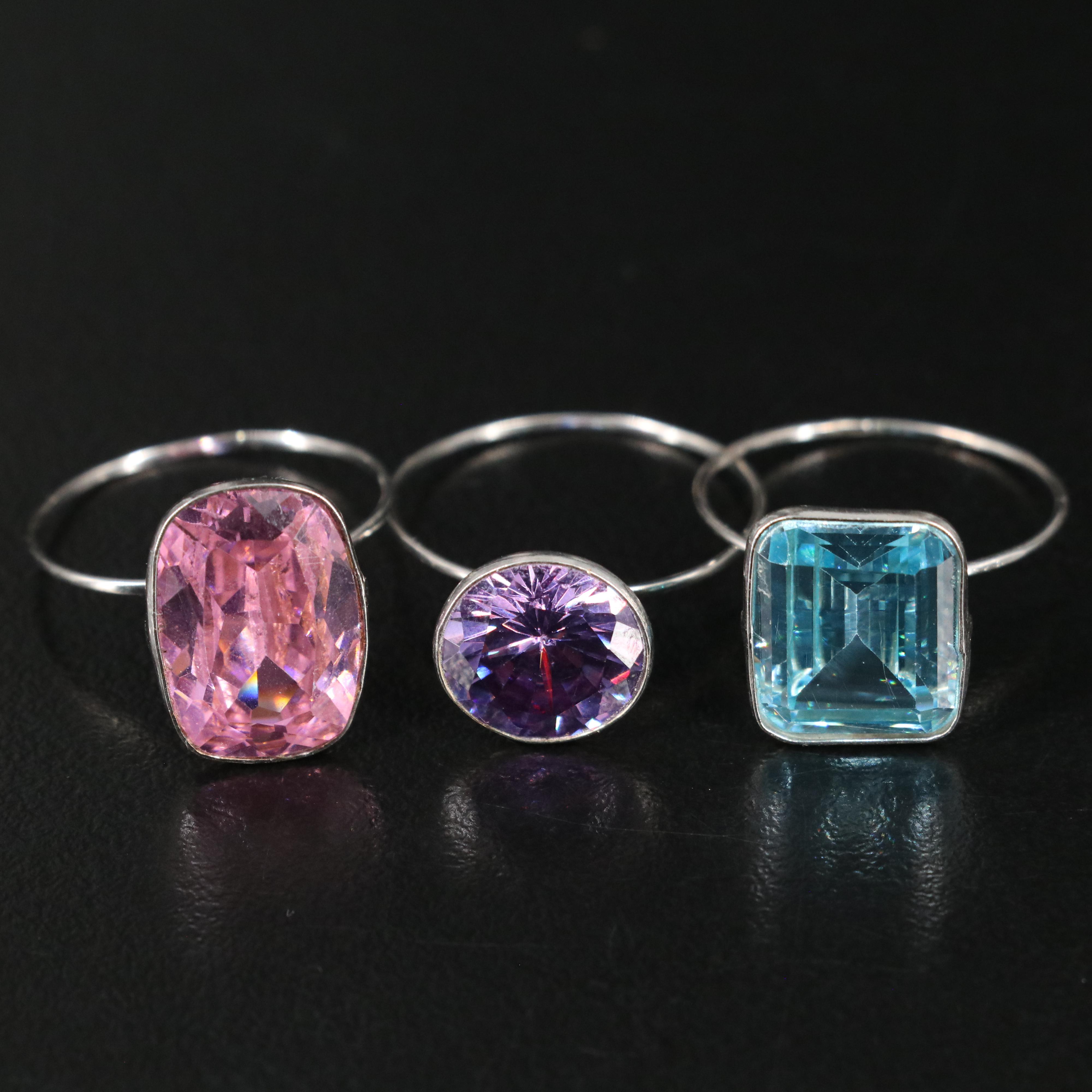 23 Silver Plated Bracelets, Rings, and Pendants