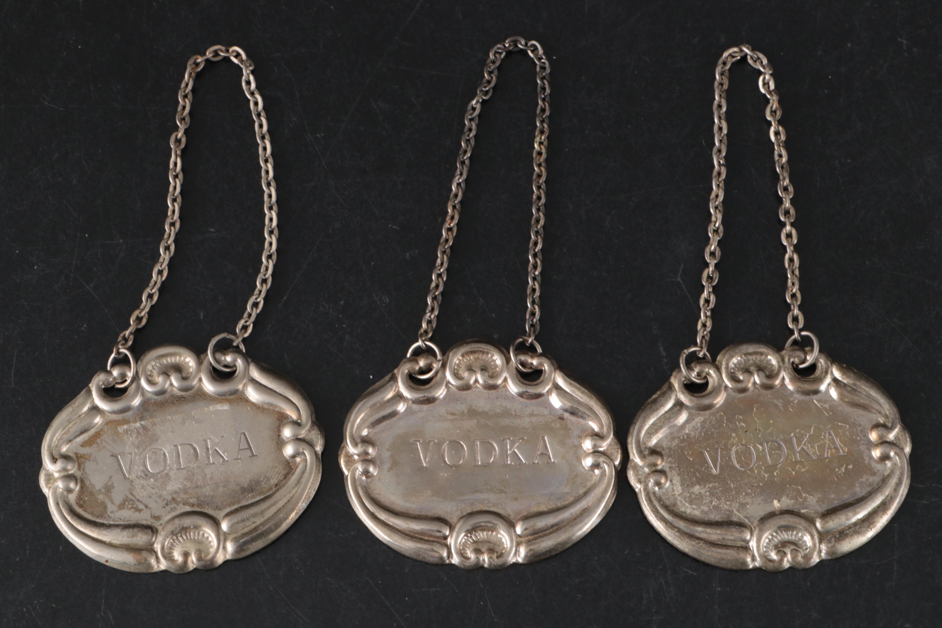 Glass Decanters with Metal Decanter Tags and Candle Snuffer