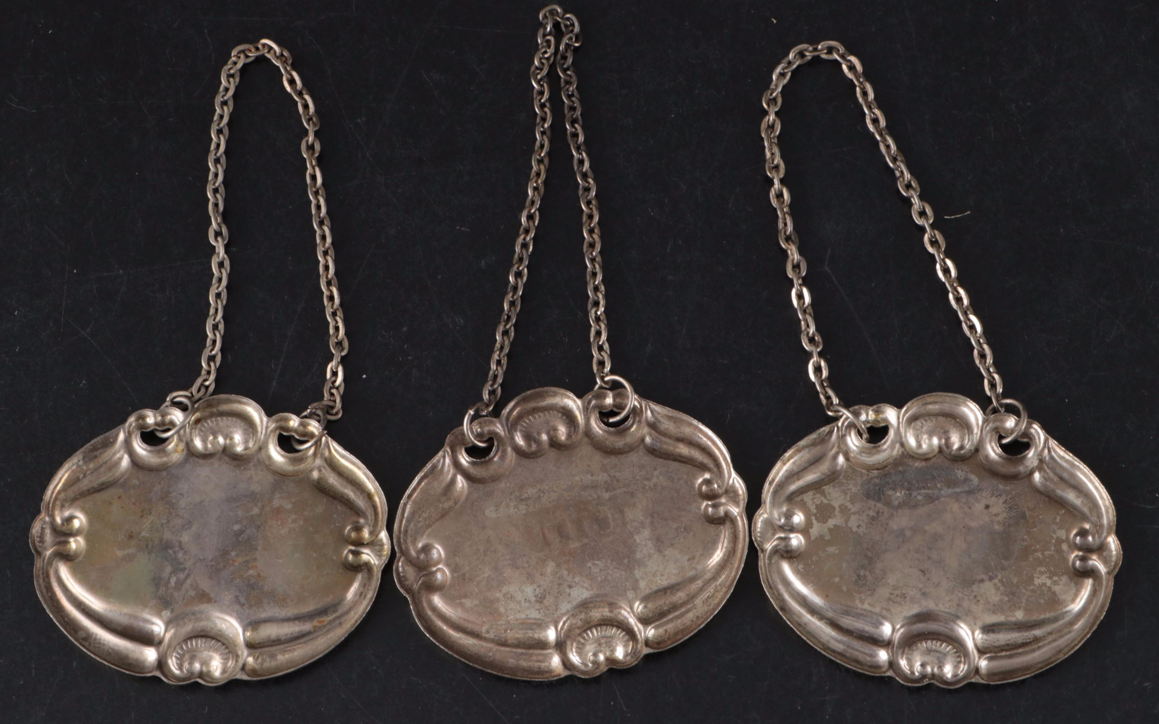 Glass Decanters with Metal Decanter Tags and Candle Snuffer