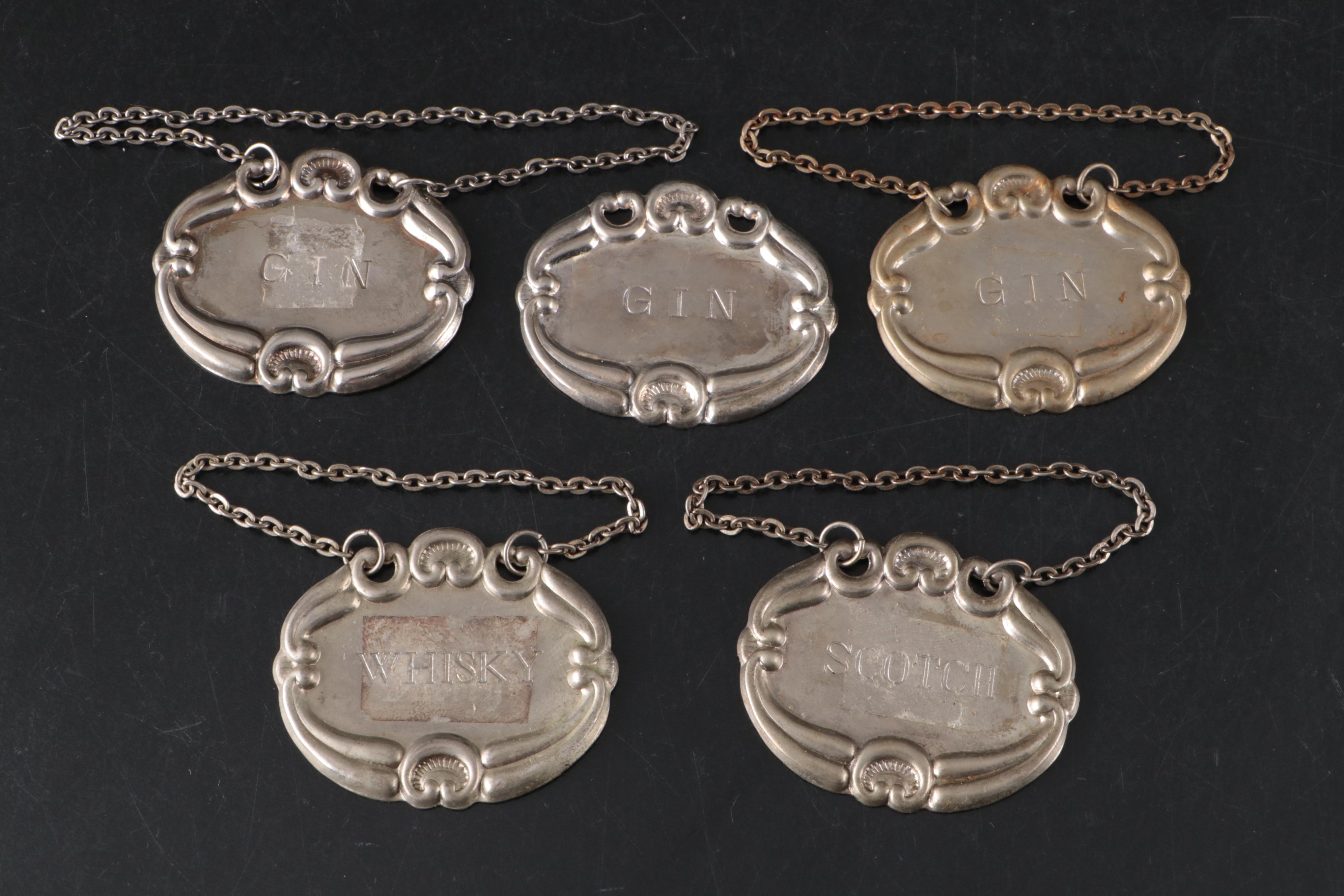 Glass Decanters with Metal Decanter Tags and Candle Snuffer