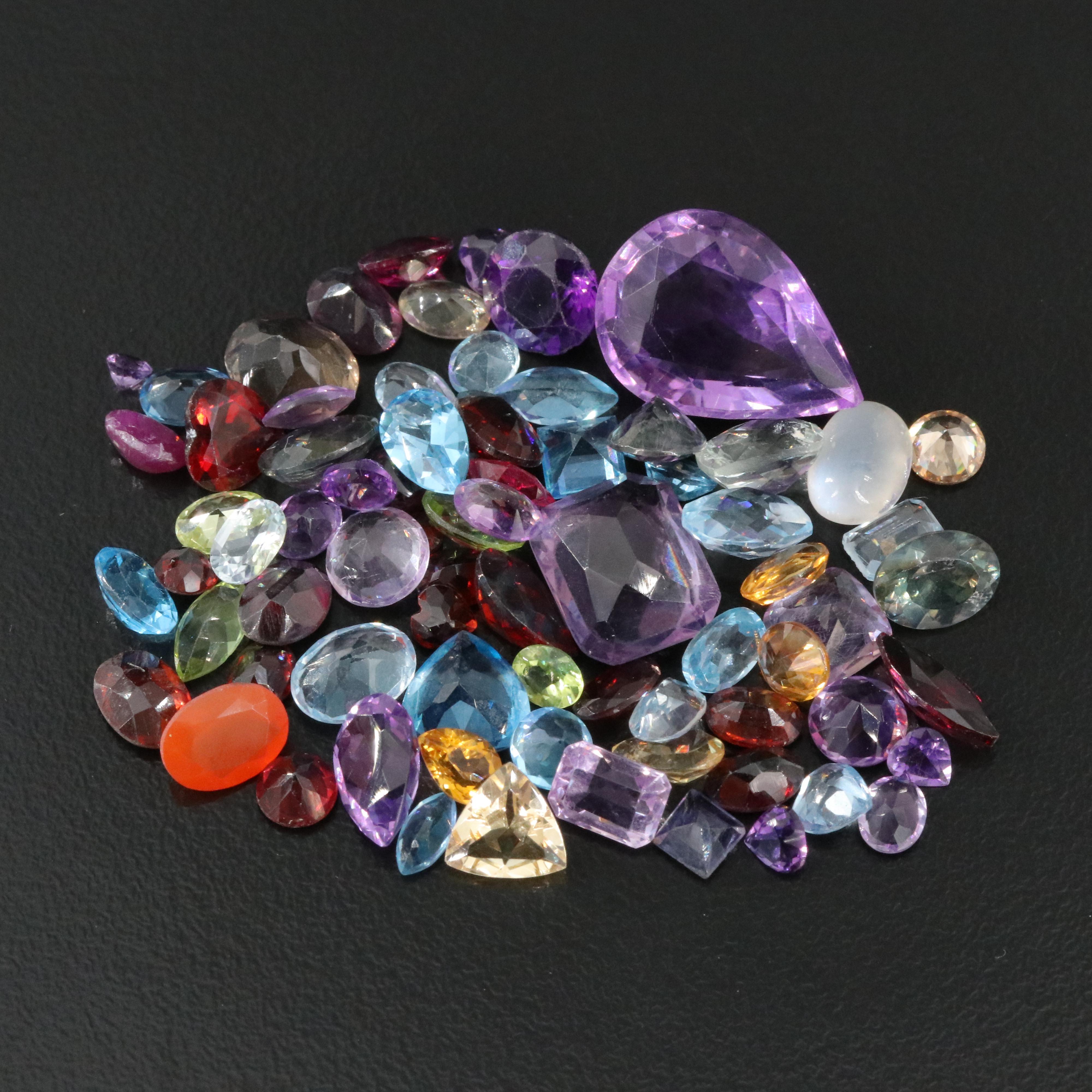 Loose Gemstone Lot Including Amethyst, Topaz and Garnet