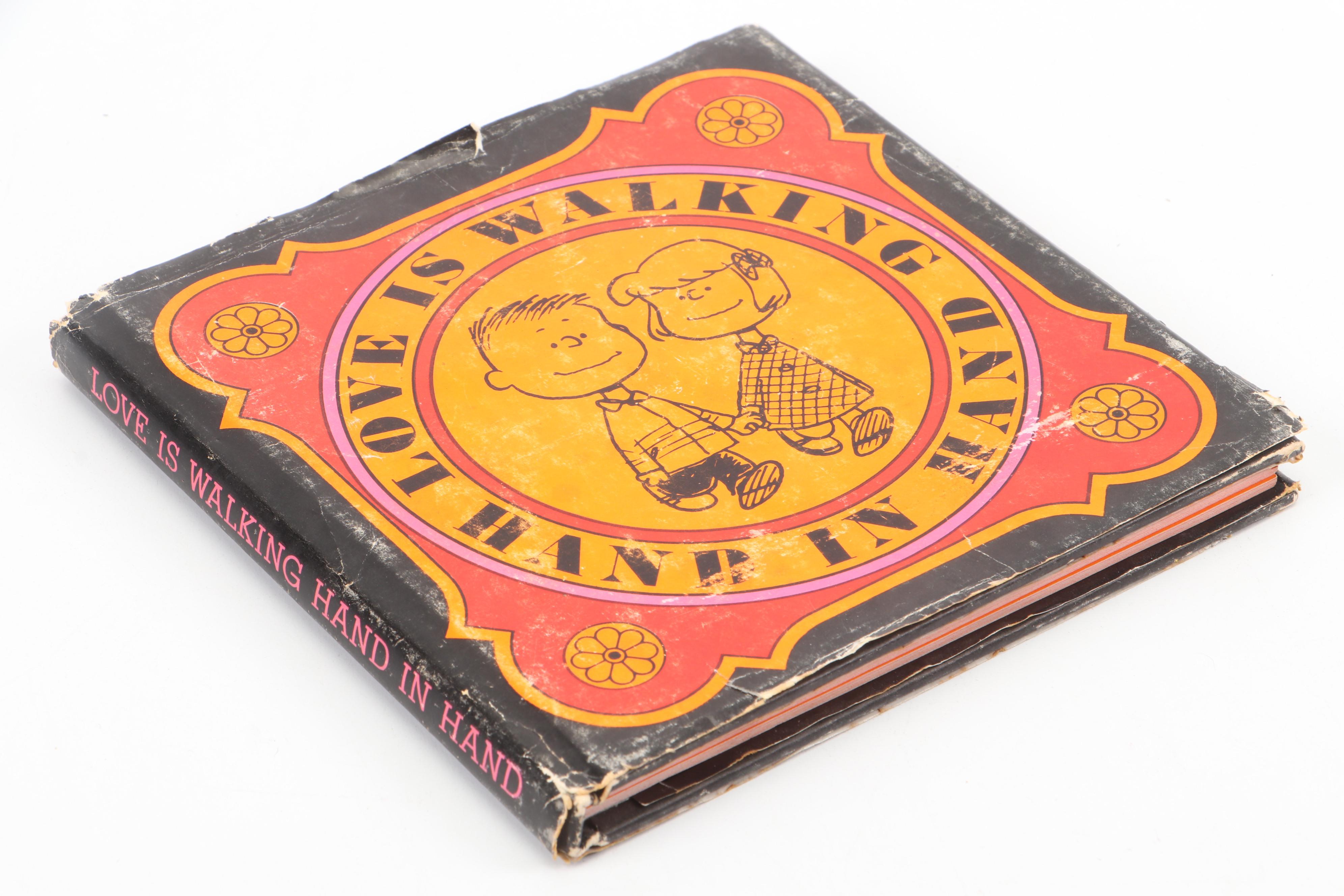 "The Complete Peanuts" and "Love is Walking Hand in Hand" by Charles M. Schulz