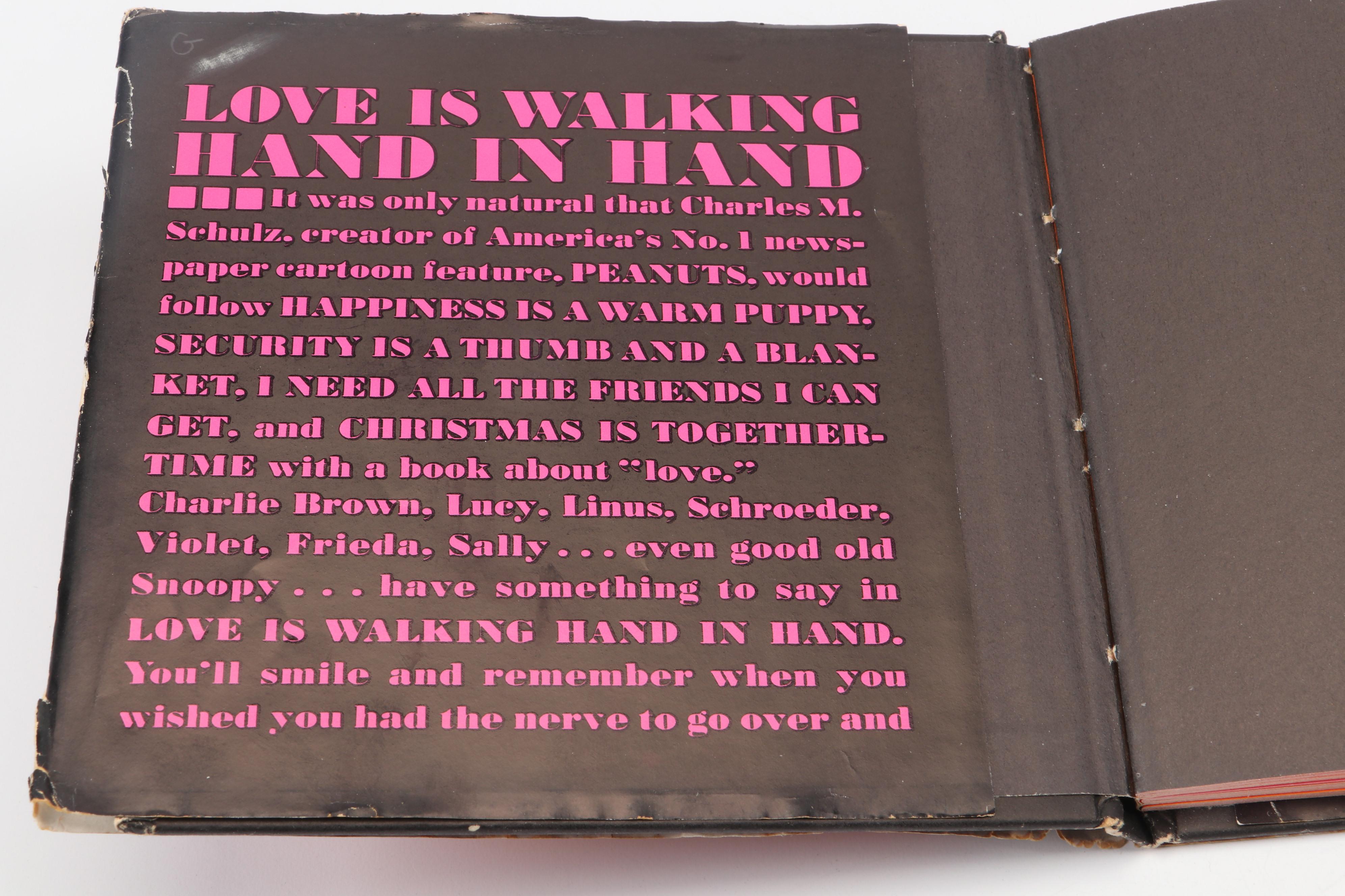 "The Complete Peanuts" and "Love is Walking Hand in Hand" by Charles M. Schulz