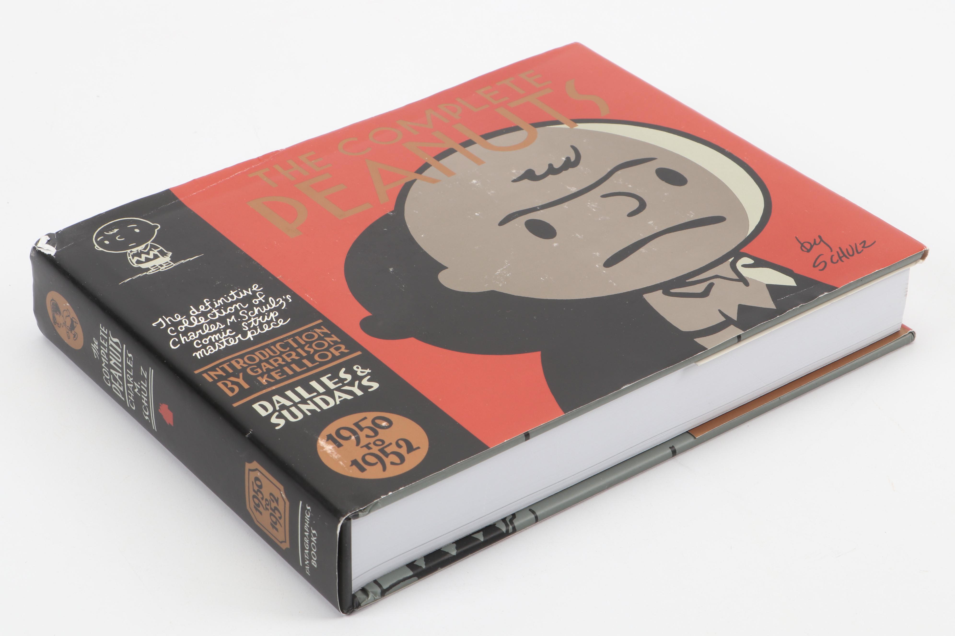 "The Complete Peanuts" and "Love is Walking Hand in Hand" by Charles M. Schulz