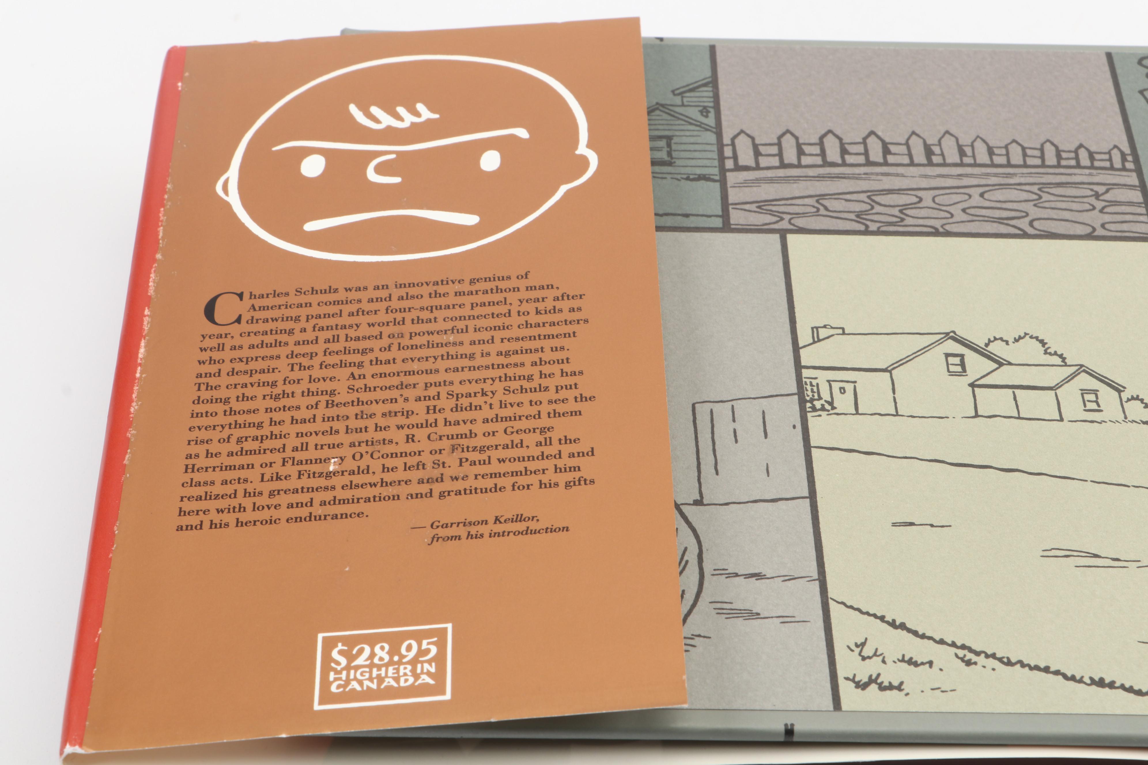 "The Complete Peanuts" and "Love is Walking Hand in Hand" by Charles M. Schulz