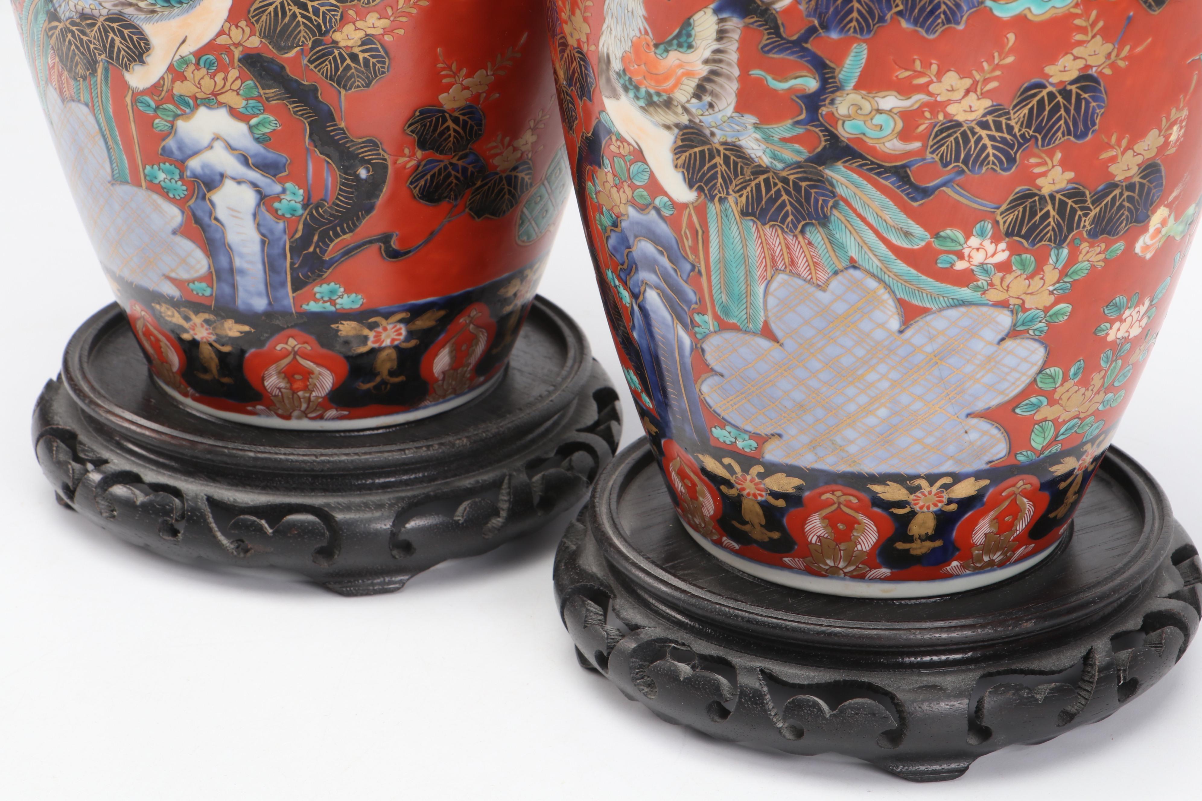 Pair of Japanese Porcelain Imari Baluster Vases with Wooden Stands