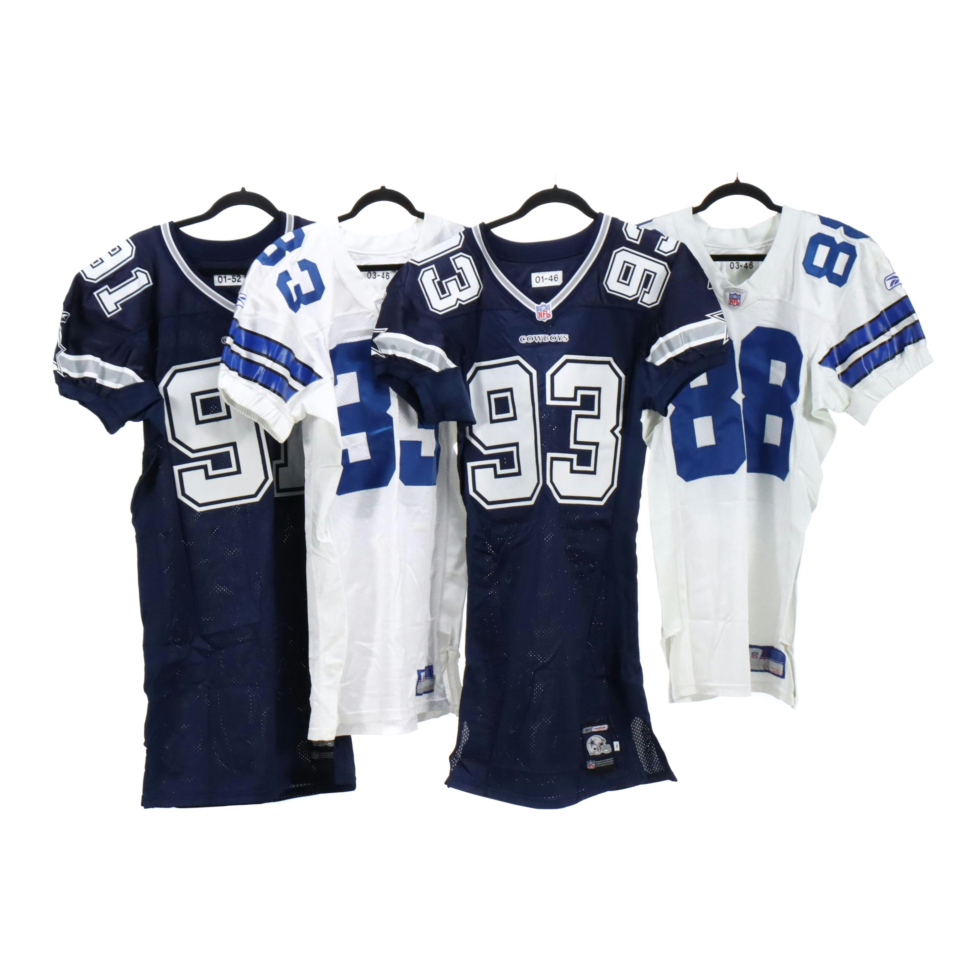 Antonio Bryant with Other Player Issued Dallas Cowboys Football Jerseys