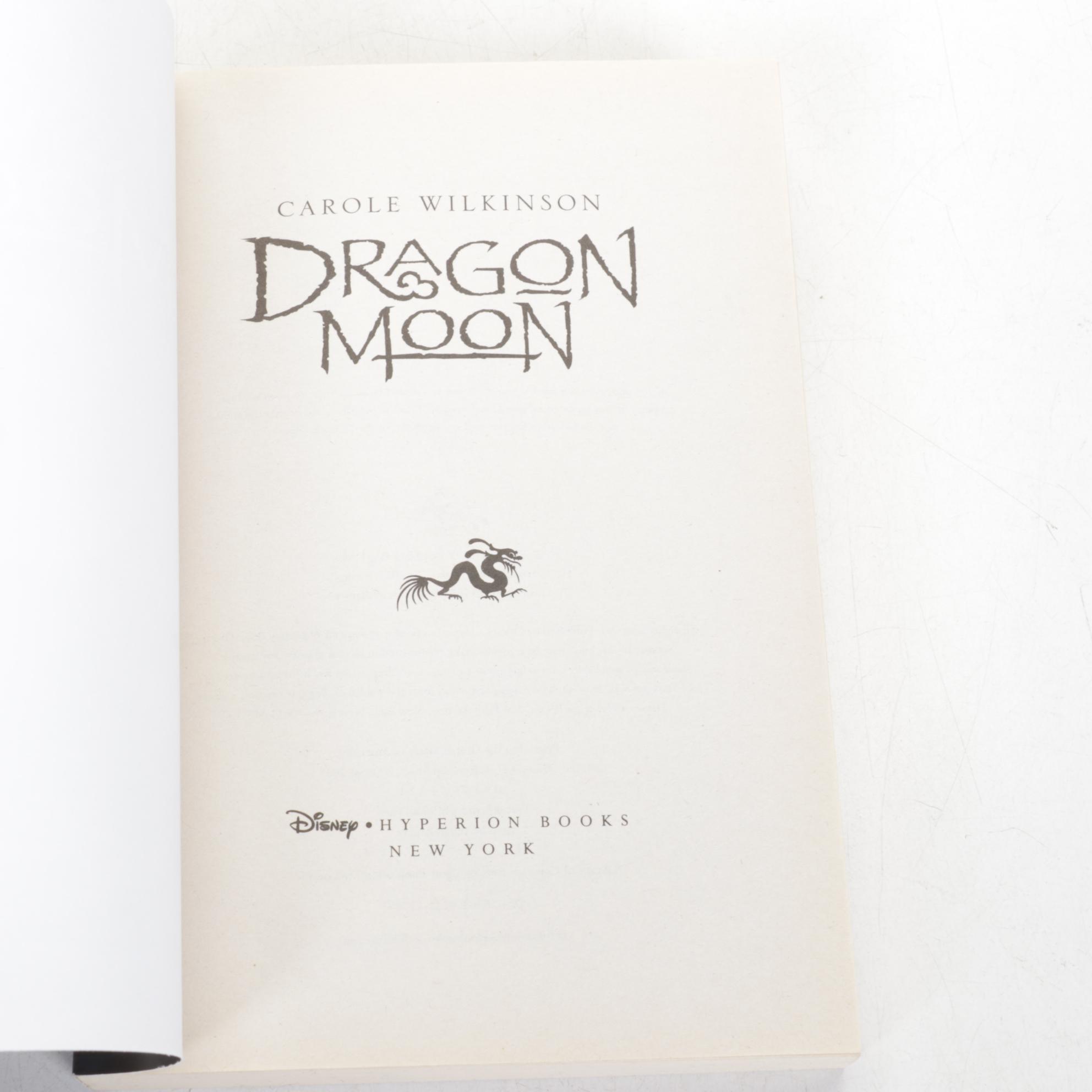 First Edition "Fantastic Beasts..." by J.K. Rowling & Dragon Themed Books