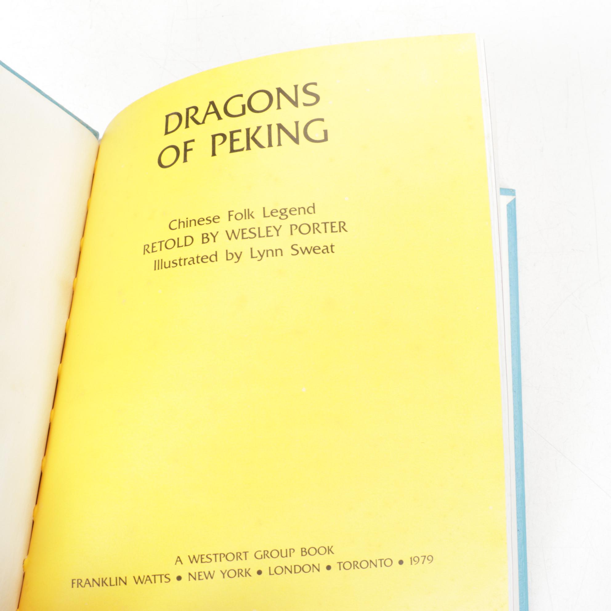 First Edition "Fantastic Beasts..." by J.K. Rowling & Dragon Themed Books