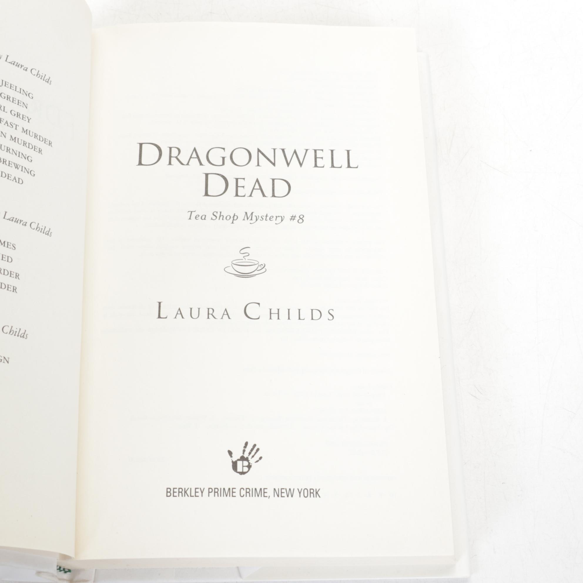 First Edition "Fantastic Beasts..." by J.K. Rowling & Dragon Themed Books