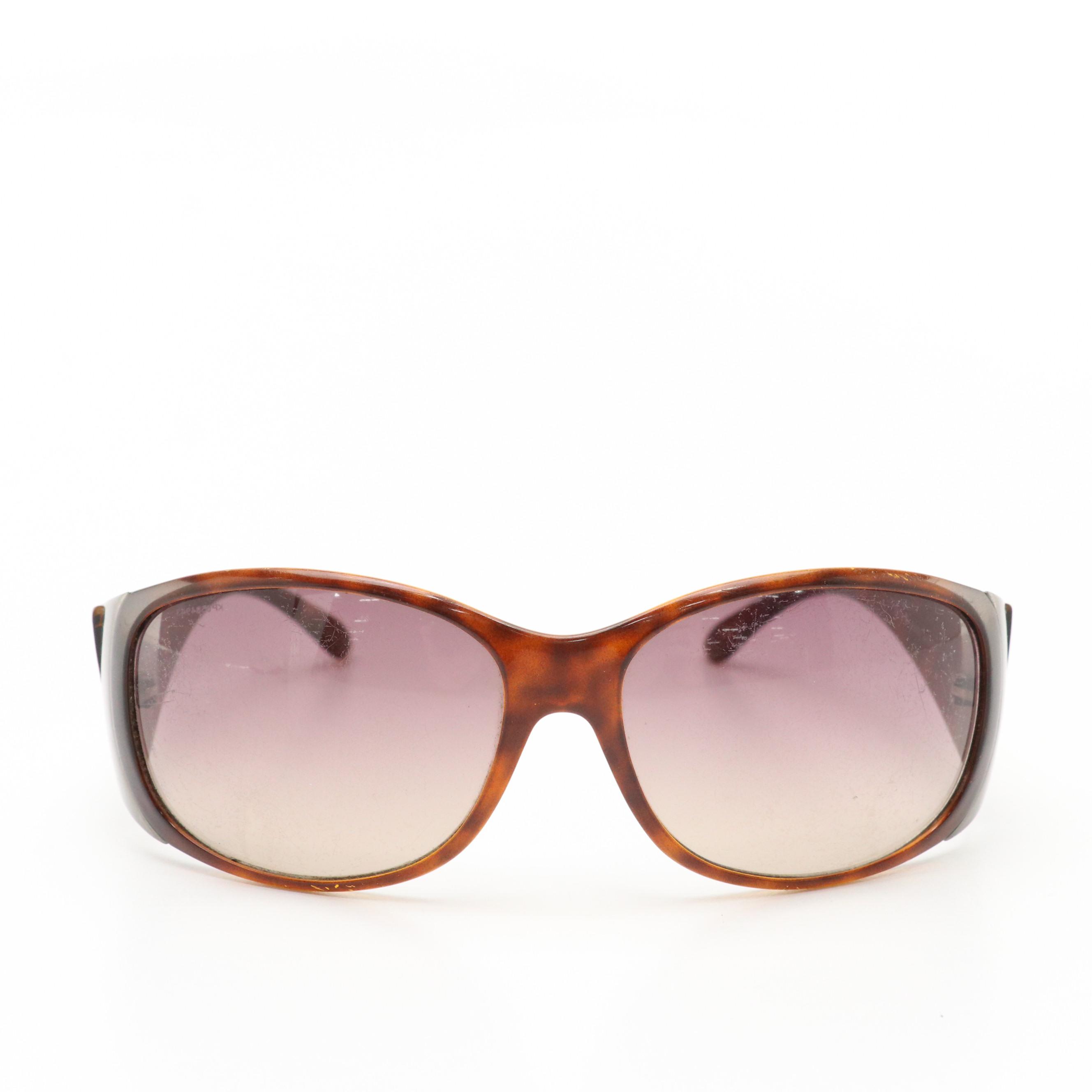 Prada SPR07G Wrap and John Varvatos V726 Oval Sunglasses