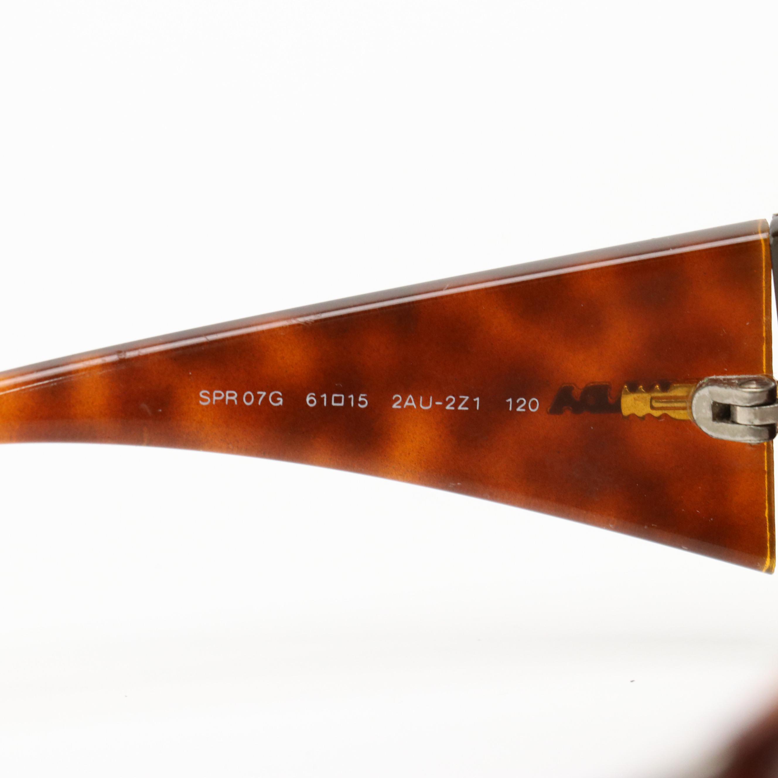 Prada SPR07G Wrap and John Varvatos V726 Oval Sunglasses