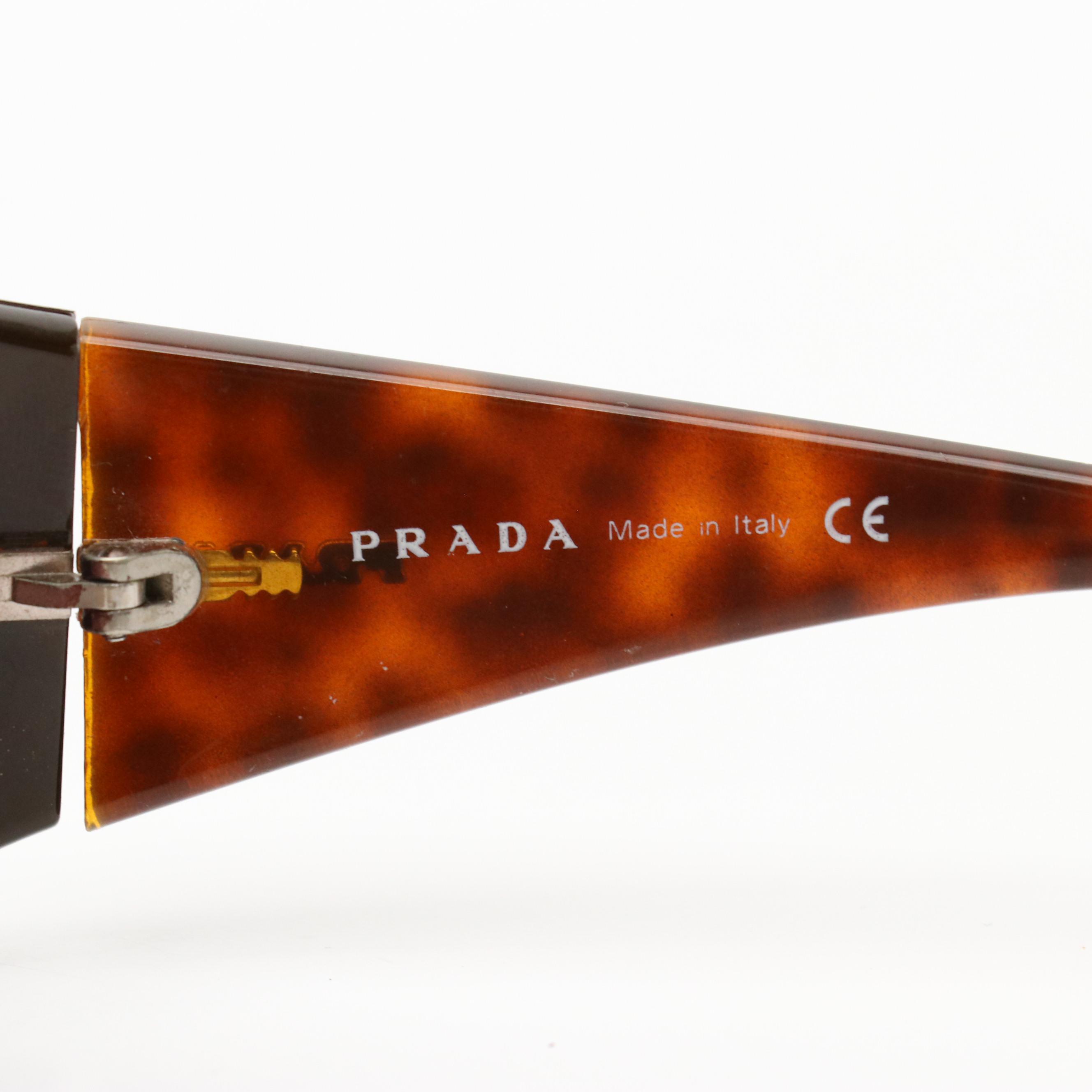Prada SPR07G Wrap and John Varvatos V726 Oval Sunglasses