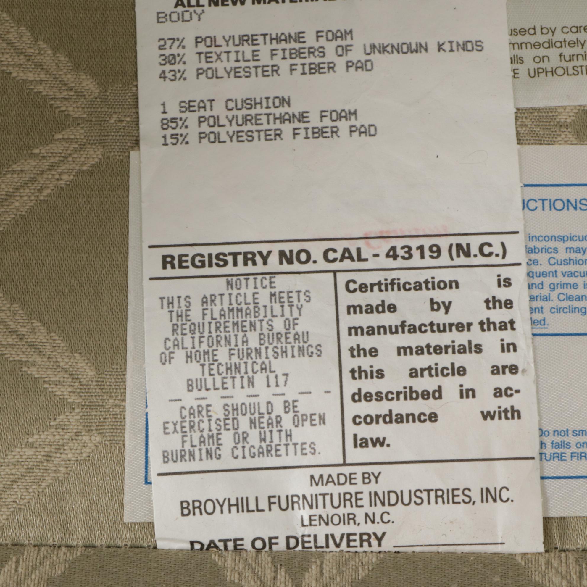 Broyhill Upholstered Wing Back Armchair and Ottoman