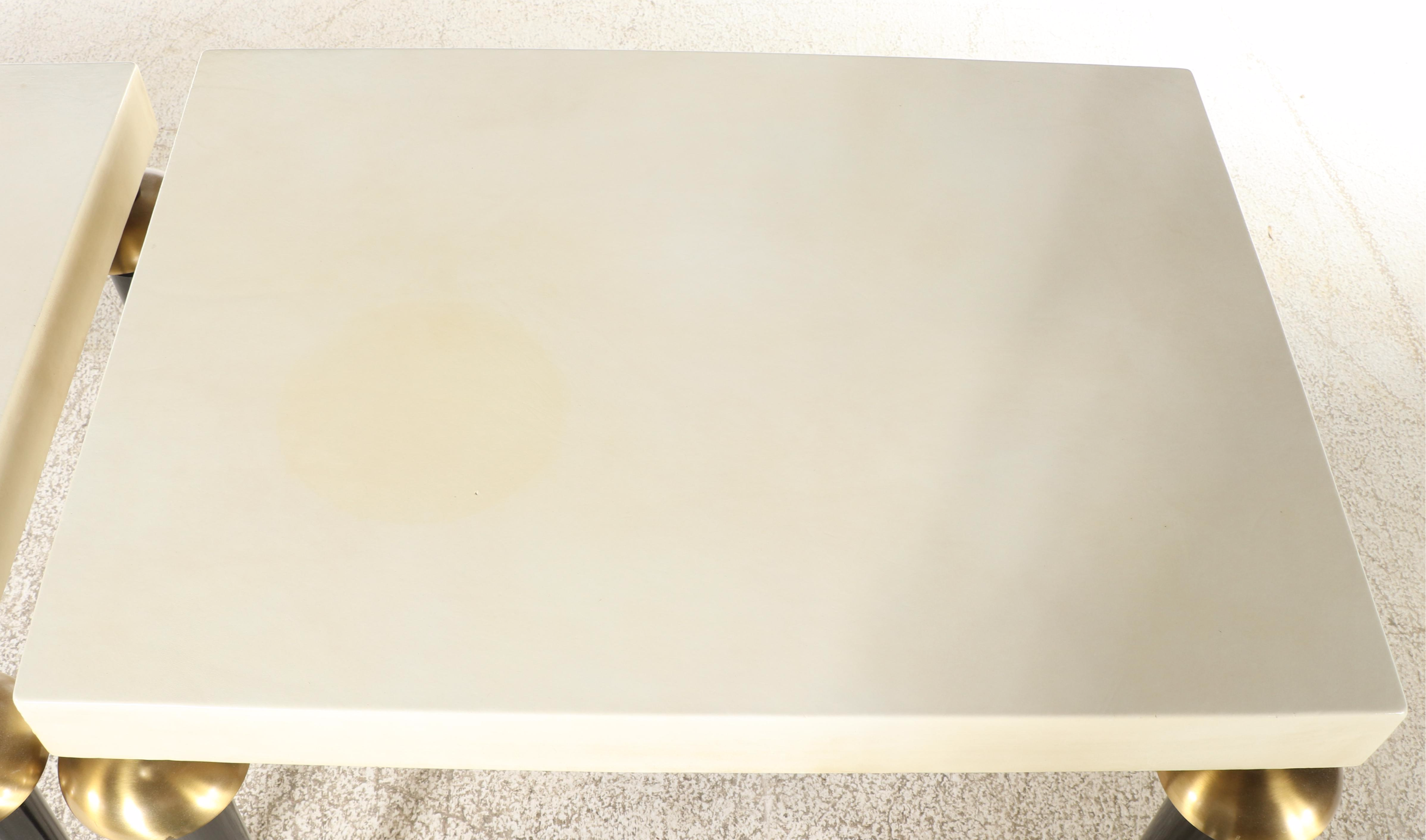 Pair of S.J. Campbell Co. Brass-Mounted, Ebonized, and Leather-Clad Side Tables