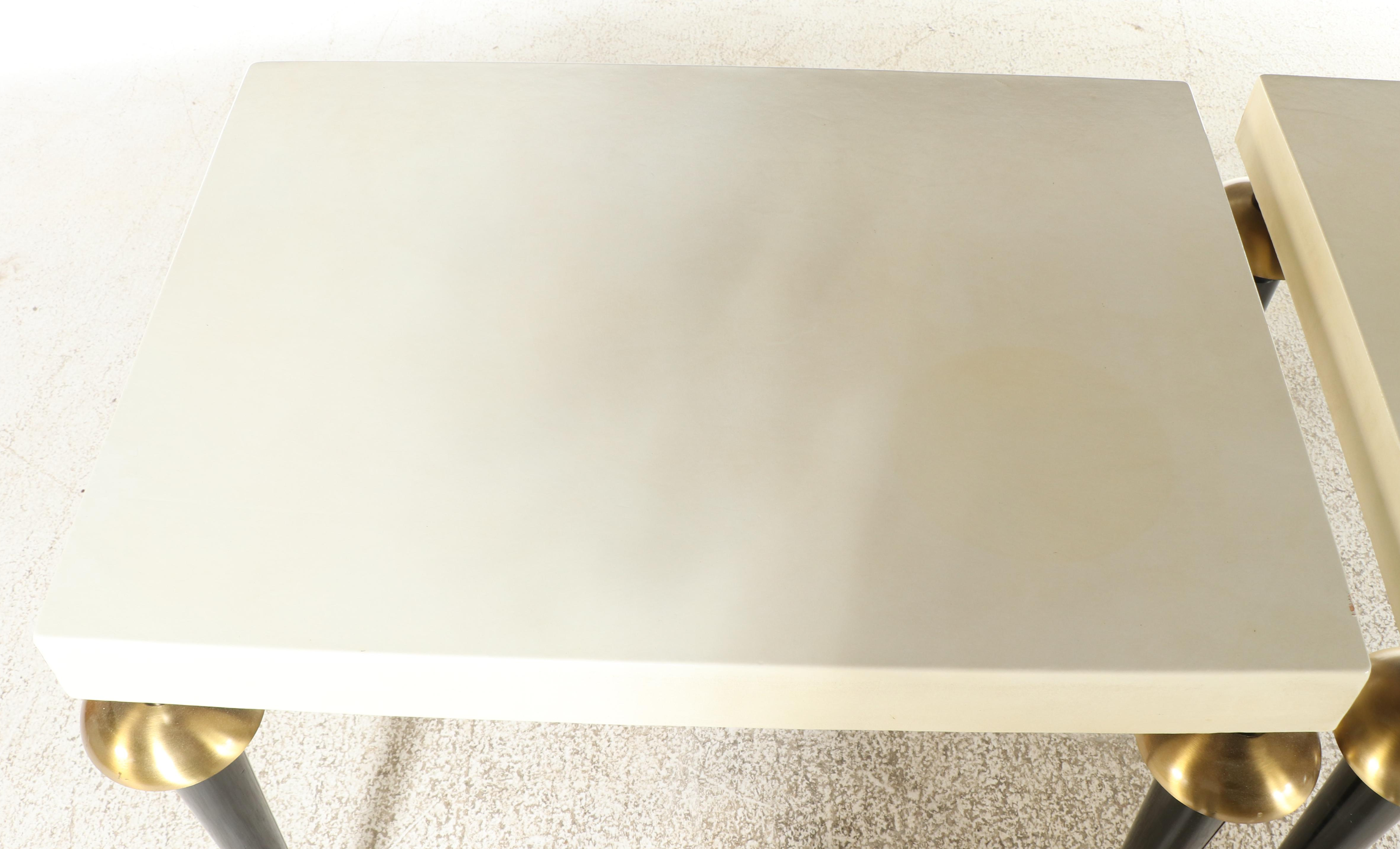 Pair of S.J. Campbell Co. Brass-Mounted, Ebonized, and Leather-Clad Side Tables