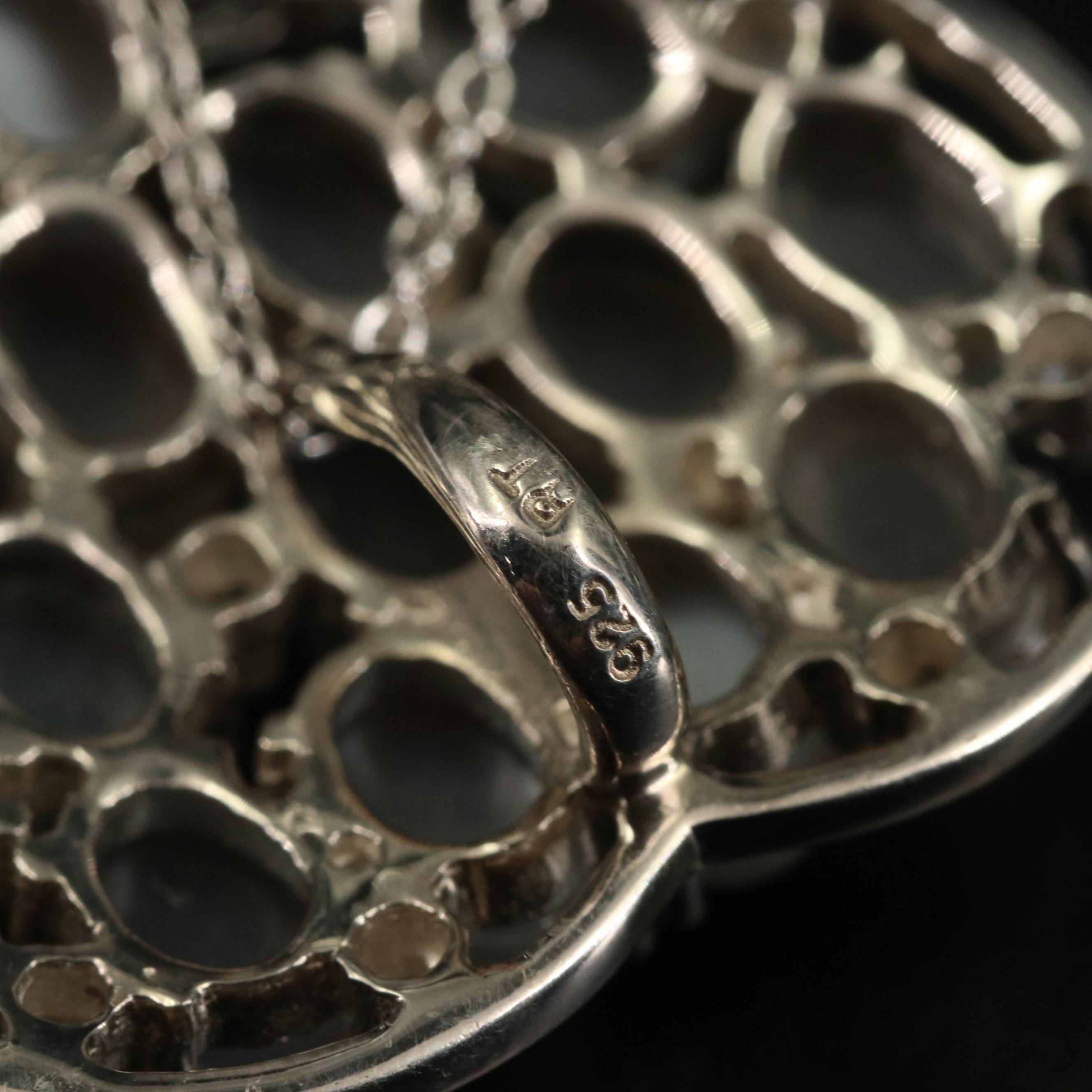 14 Assorted Sterling Silver Rings, Necklaces, Earrings, and Pendants