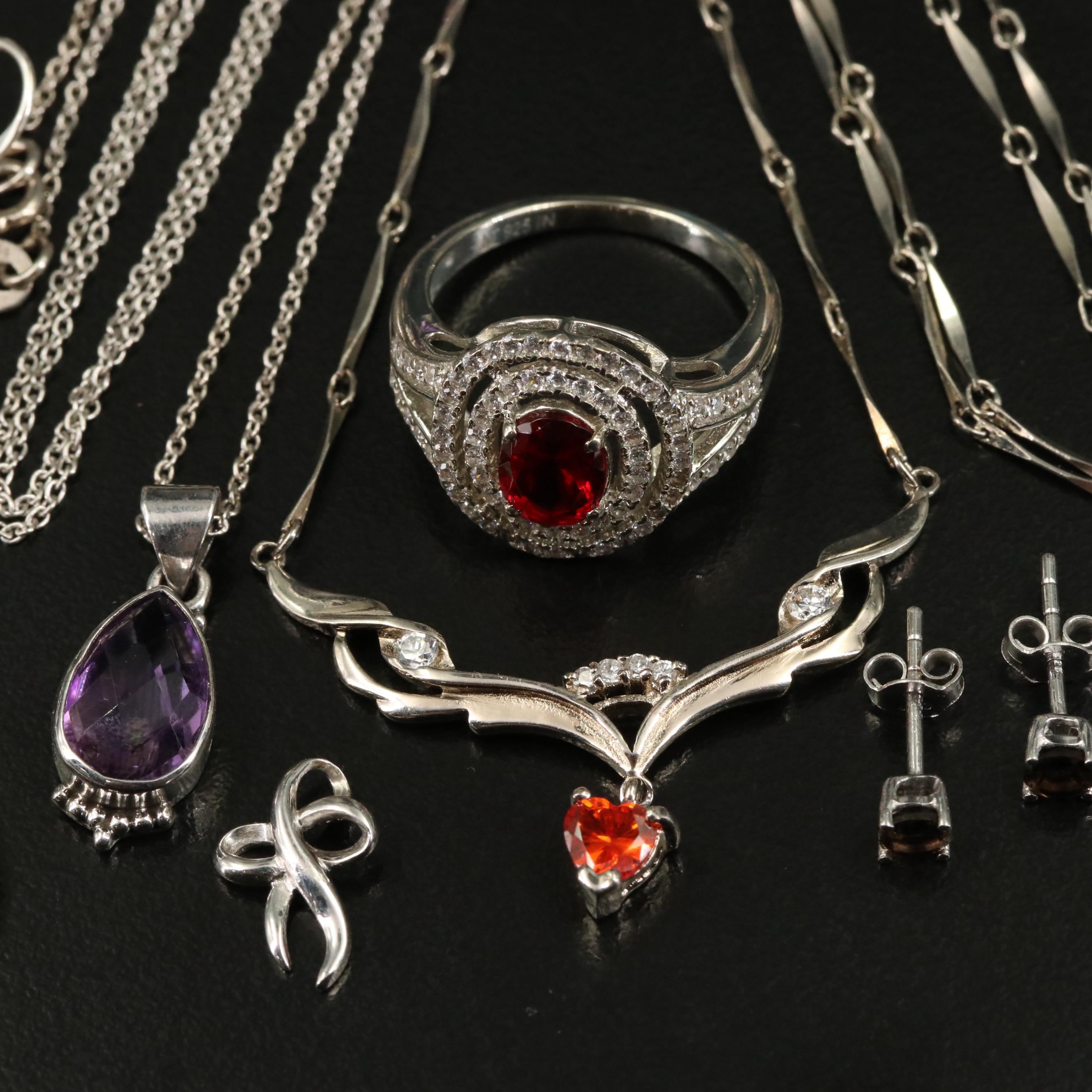 14 Assorted Sterling Silver Rings, Necklaces, Earrings, and Pendants