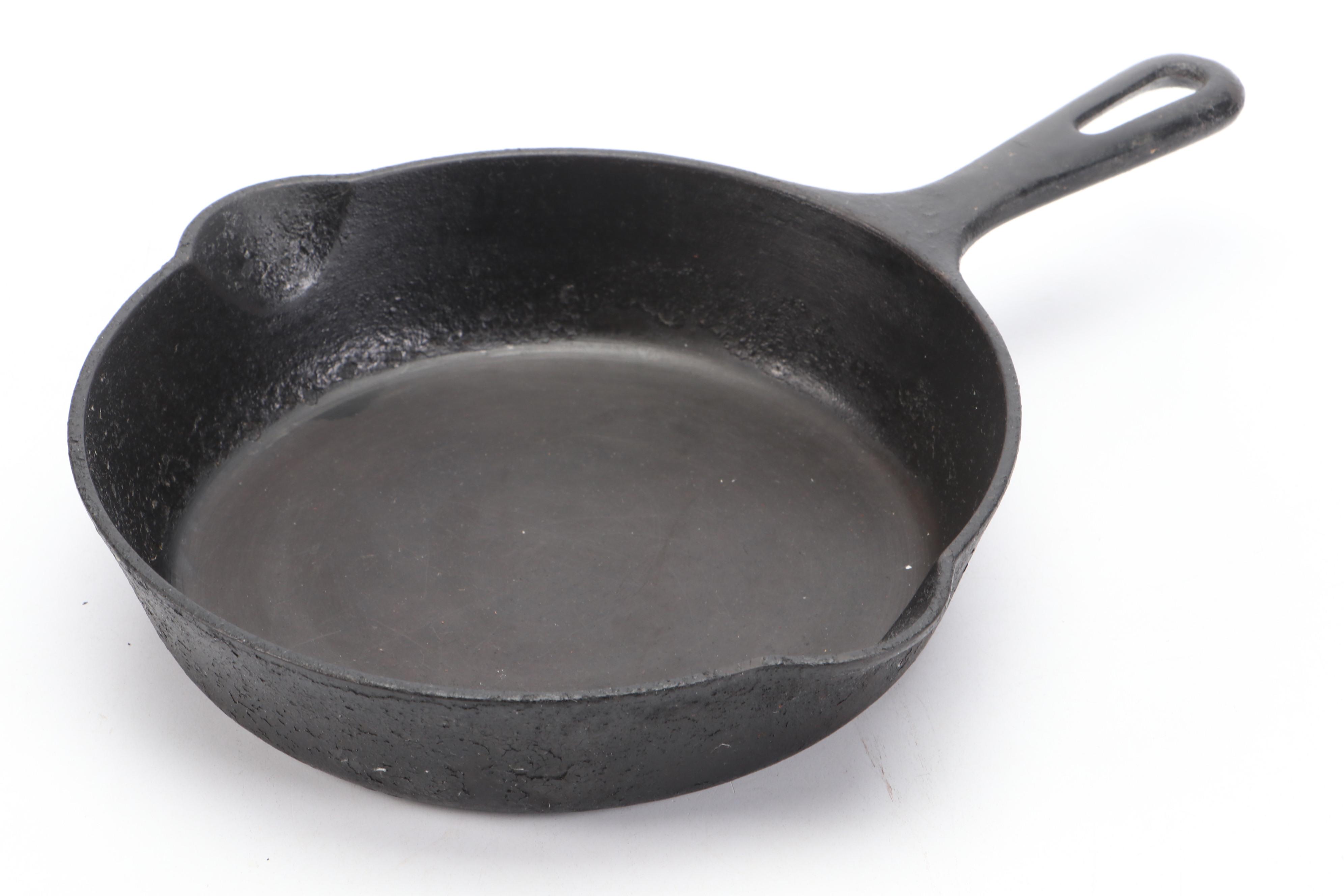 Lodge 4.2 Qt. Enameled Cast Iron Dutch Oven with Griswold Cast Iron Skillet