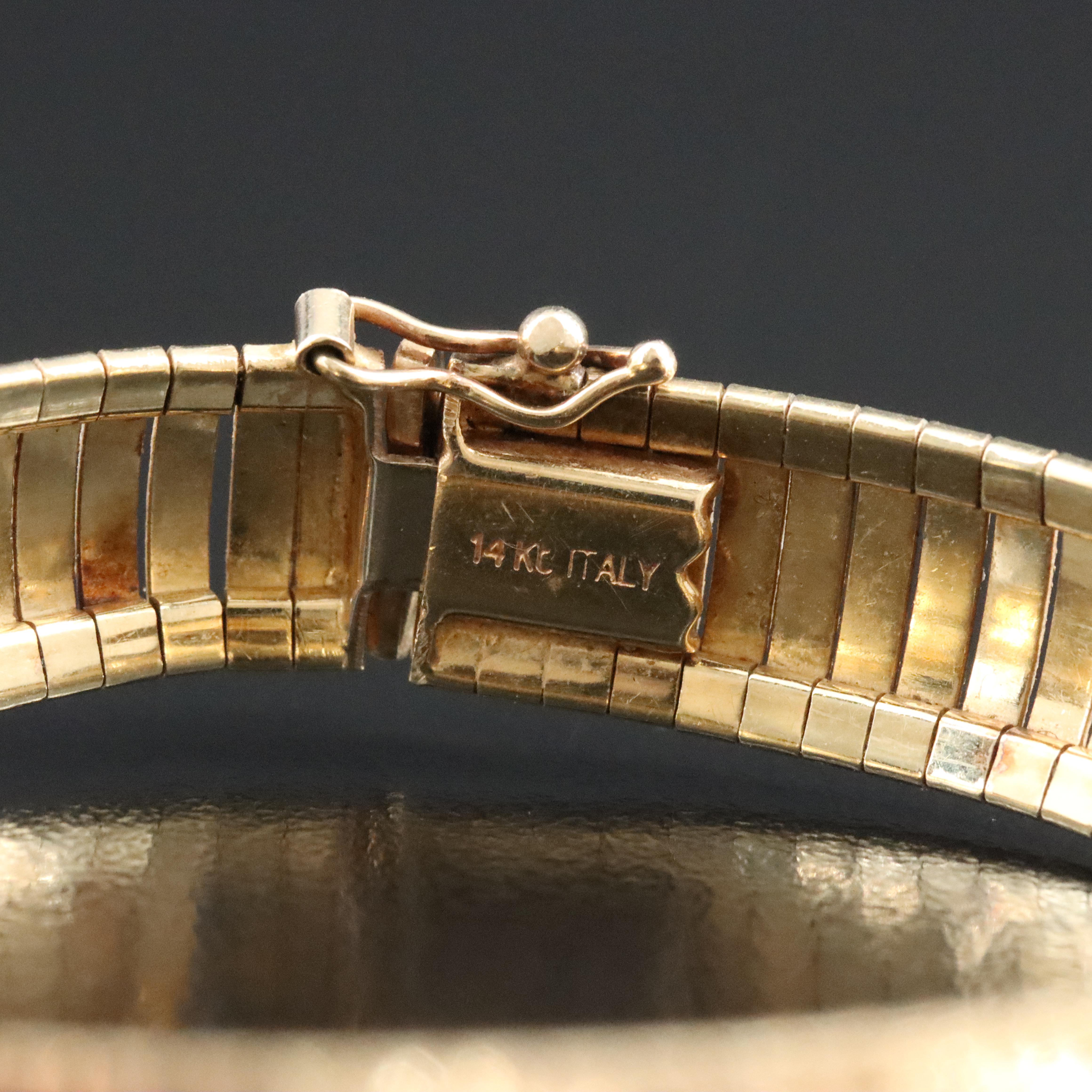 14K Omega Bracelet with Star Detail