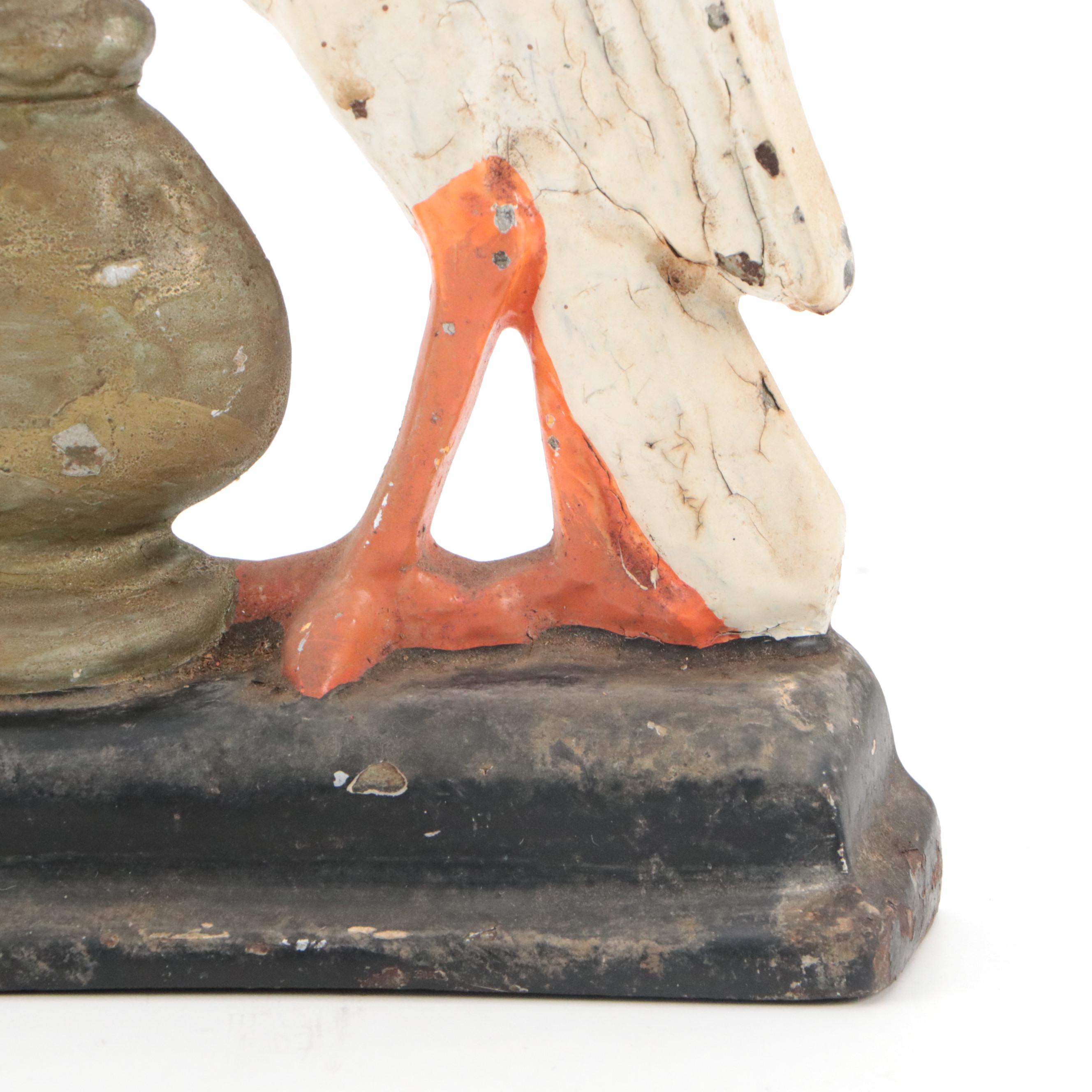 Painted Cast Iron Crane and Urn Doorstop, Early to Mid-20th Century