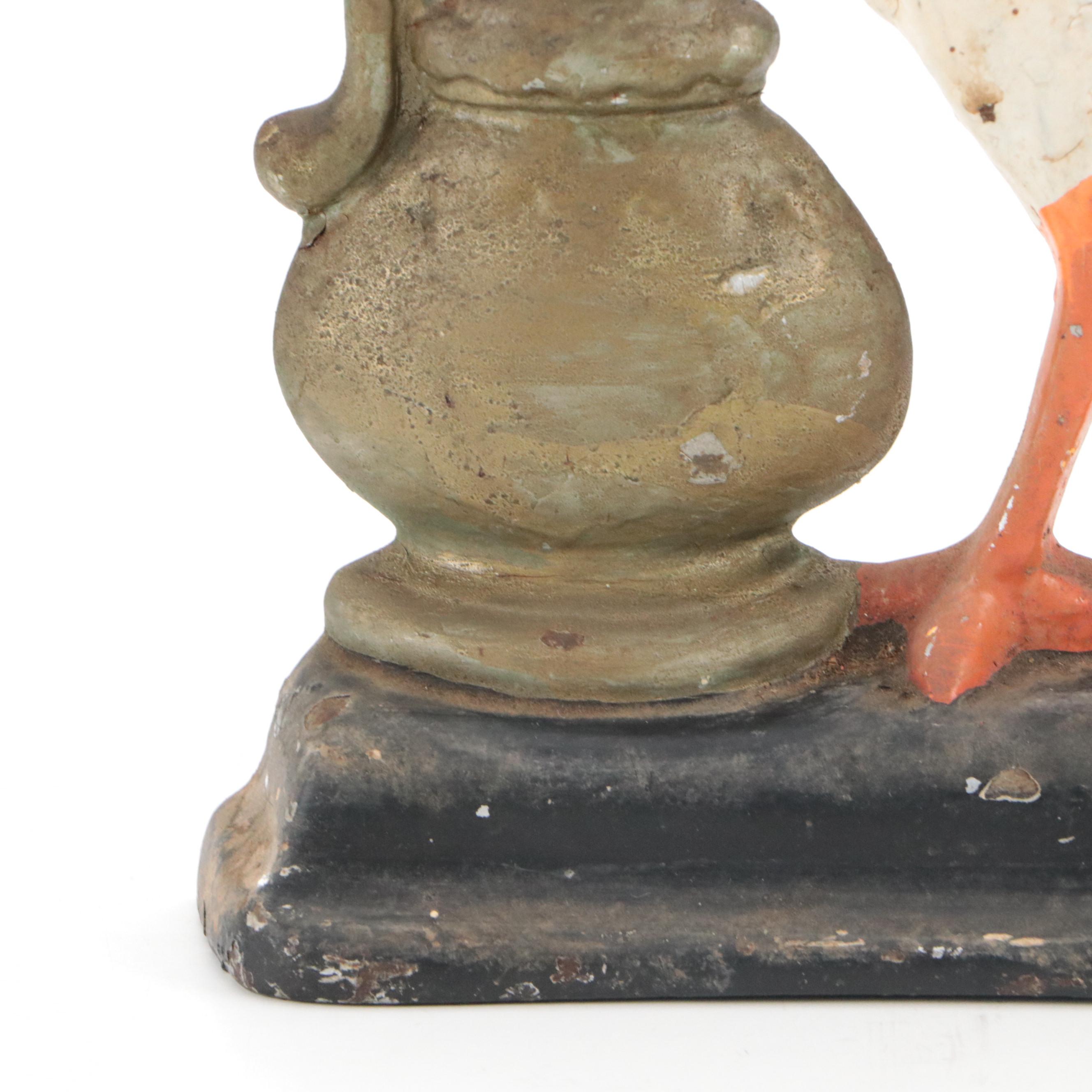 Painted Cast Iron Crane and Urn Doorstop, Early to Mid-20th Century
