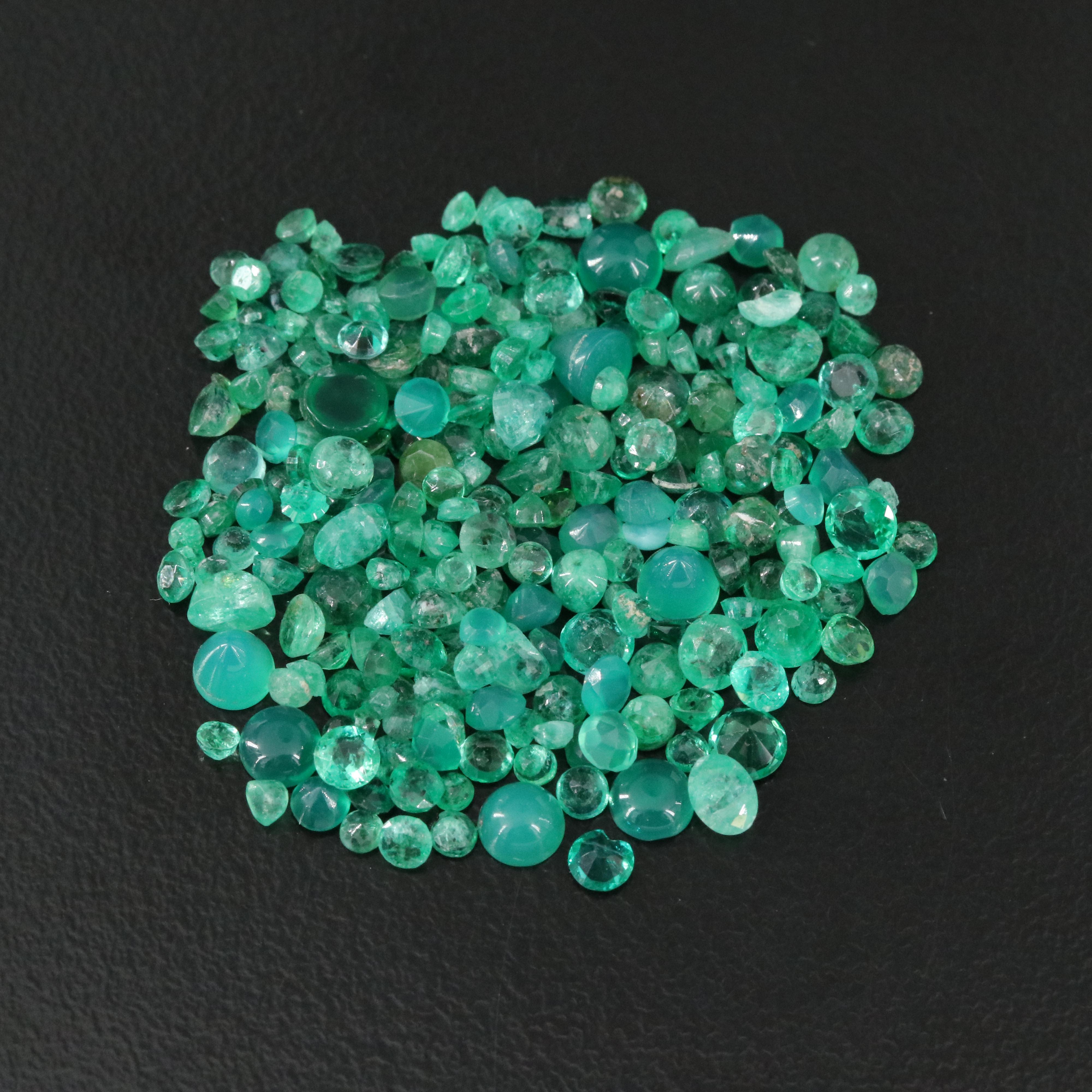 Loose 19.32 CTW Gemstone Lot Including Emerald, Chalcedony and Tsavorite