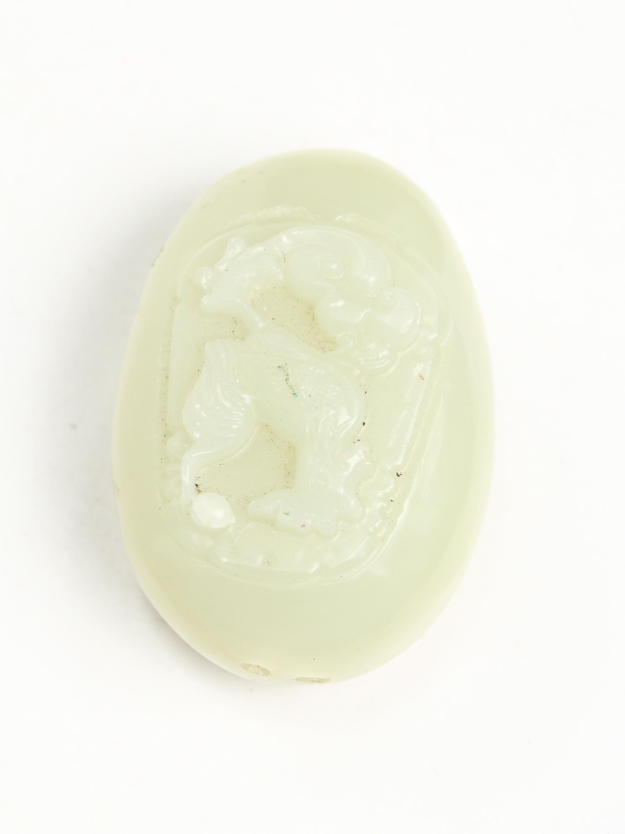 Chinese Hand-Carved Serpentine Pendants with Rooster and Dragon Motifs