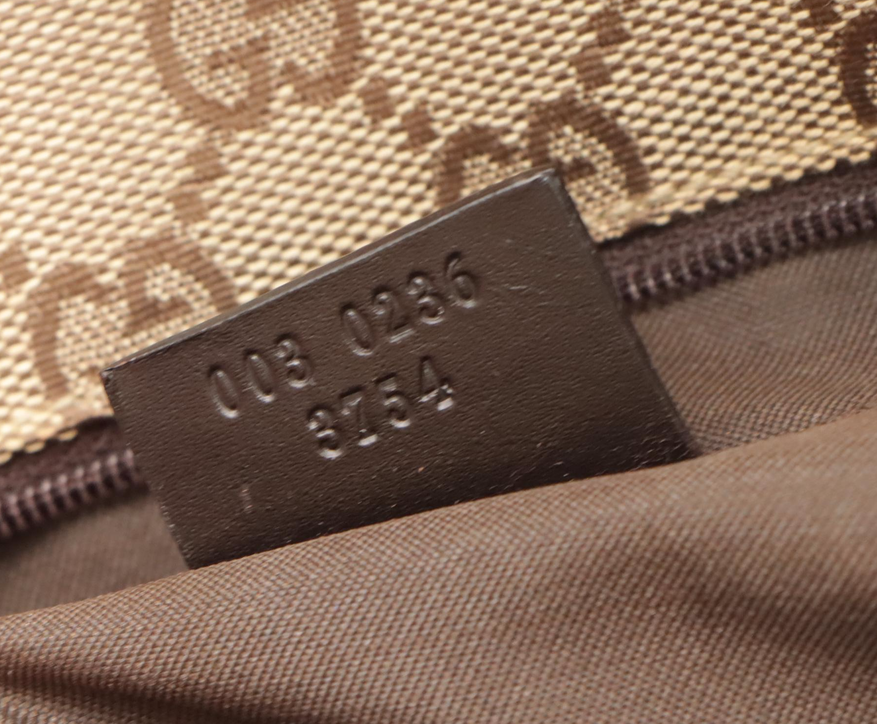 Gucci GG Canvas and Leather Backpack with Push Lock