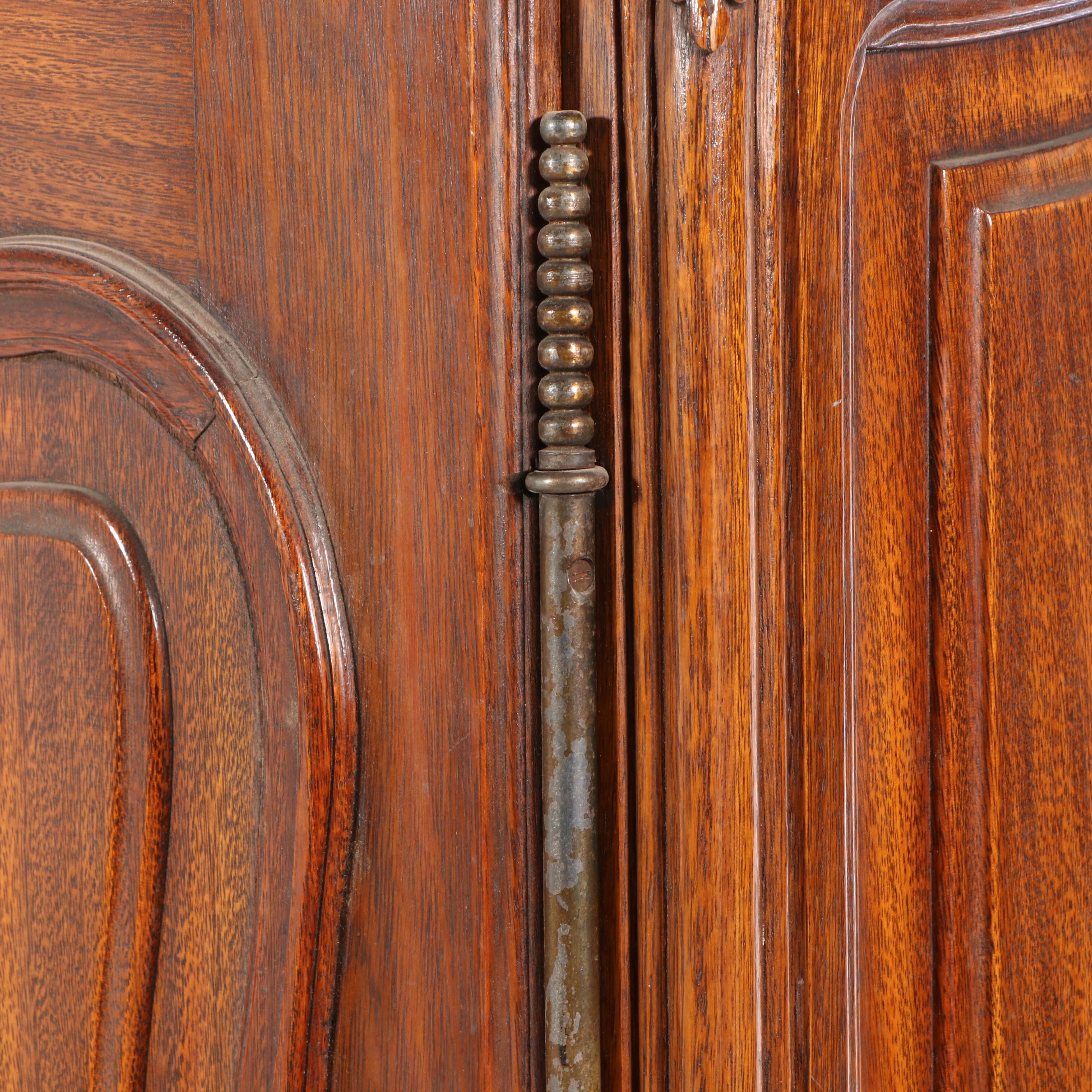 French Provincial Carved Walnut Triple-Door Armoire, Early 20th Century