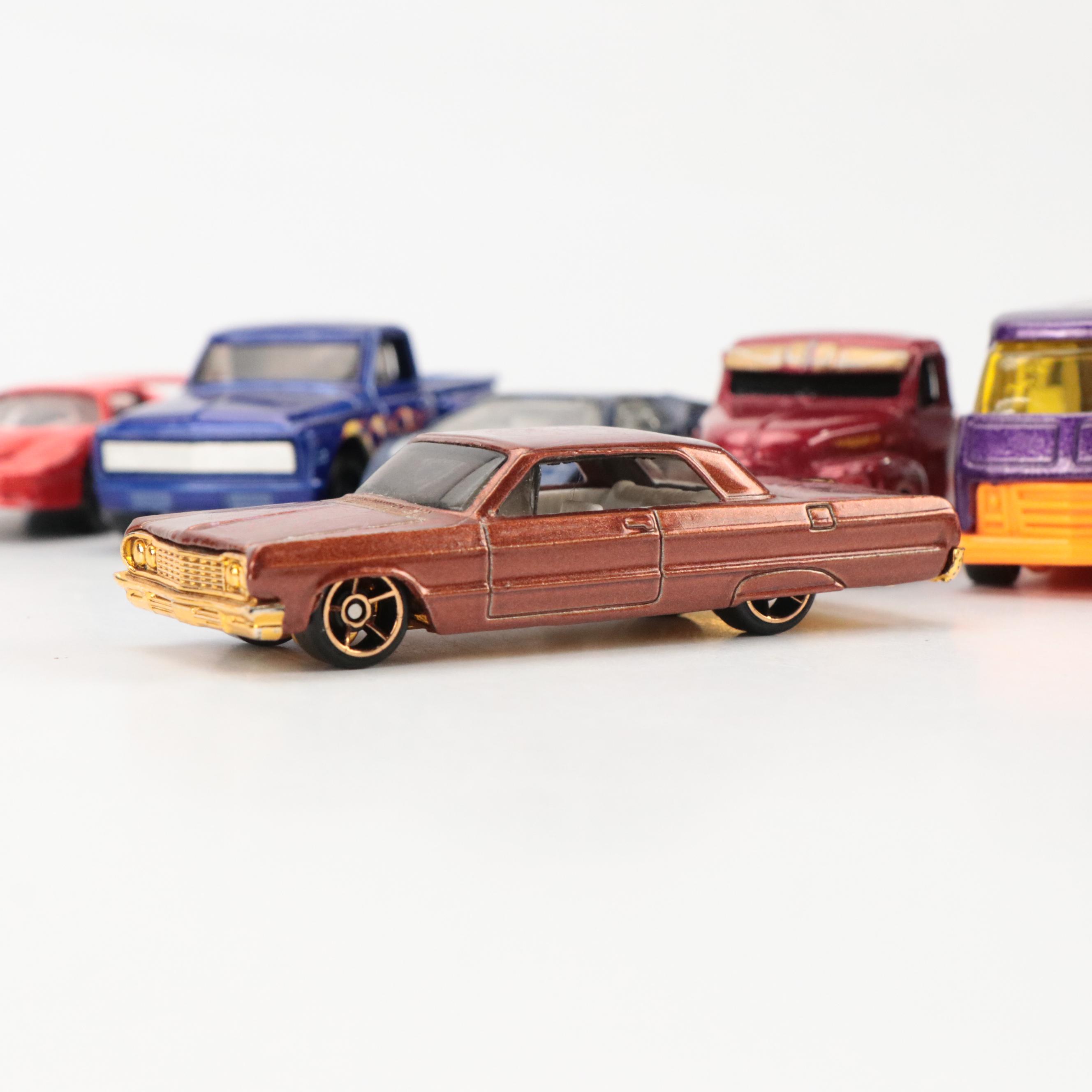 Hot Wheel GMC Motor Home, La Troca Lowrider and More Diecast Toy Cars