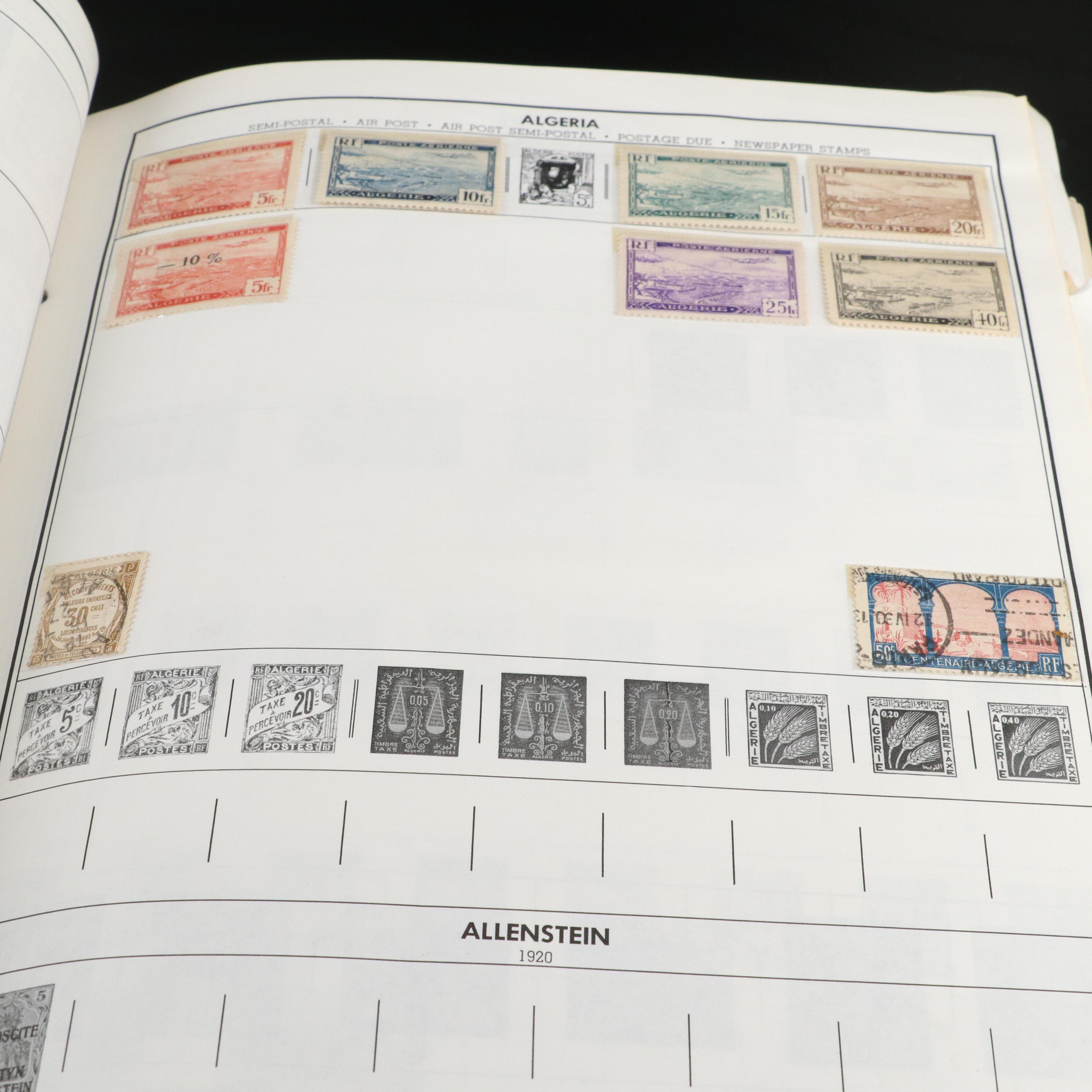 Two H.E. Harris & Co. Standard World Stamp Albums