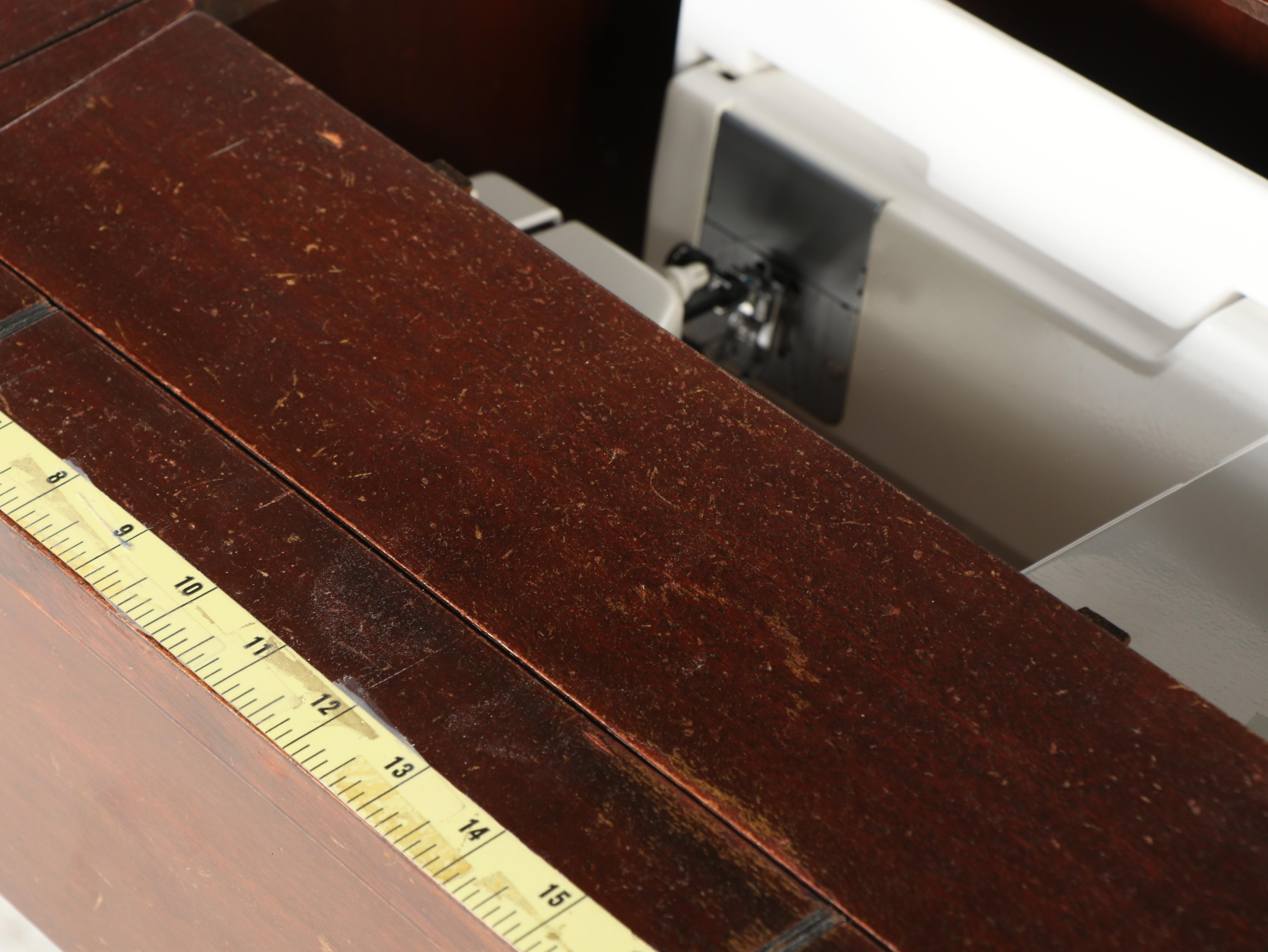 Elna Carina Sewing Machine in Mahogany Cabinet, Mid to Late 20th Century