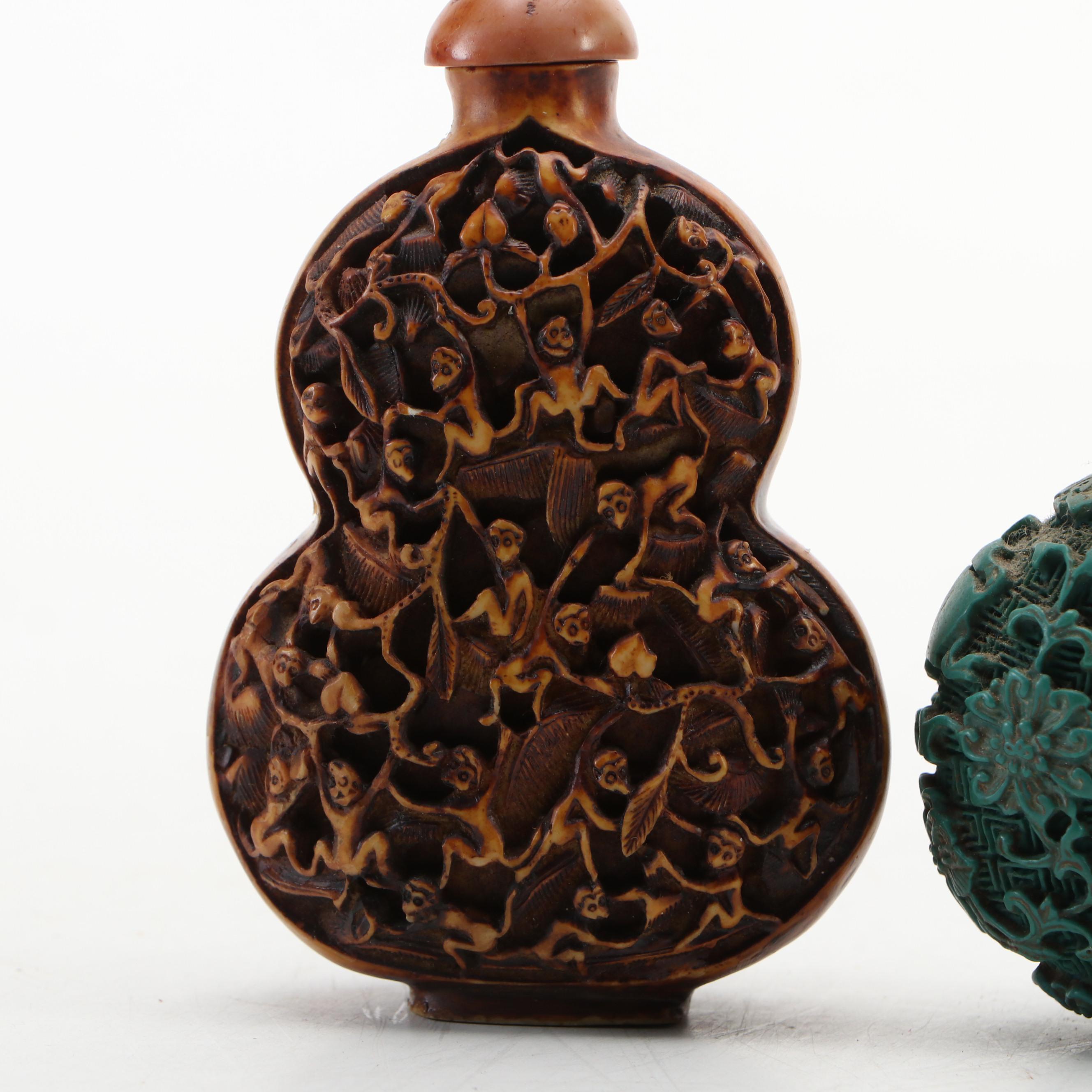 Chinese Reverse Painted Glass and Faux Cinnabar Style Carved Resin Snuff Bottles