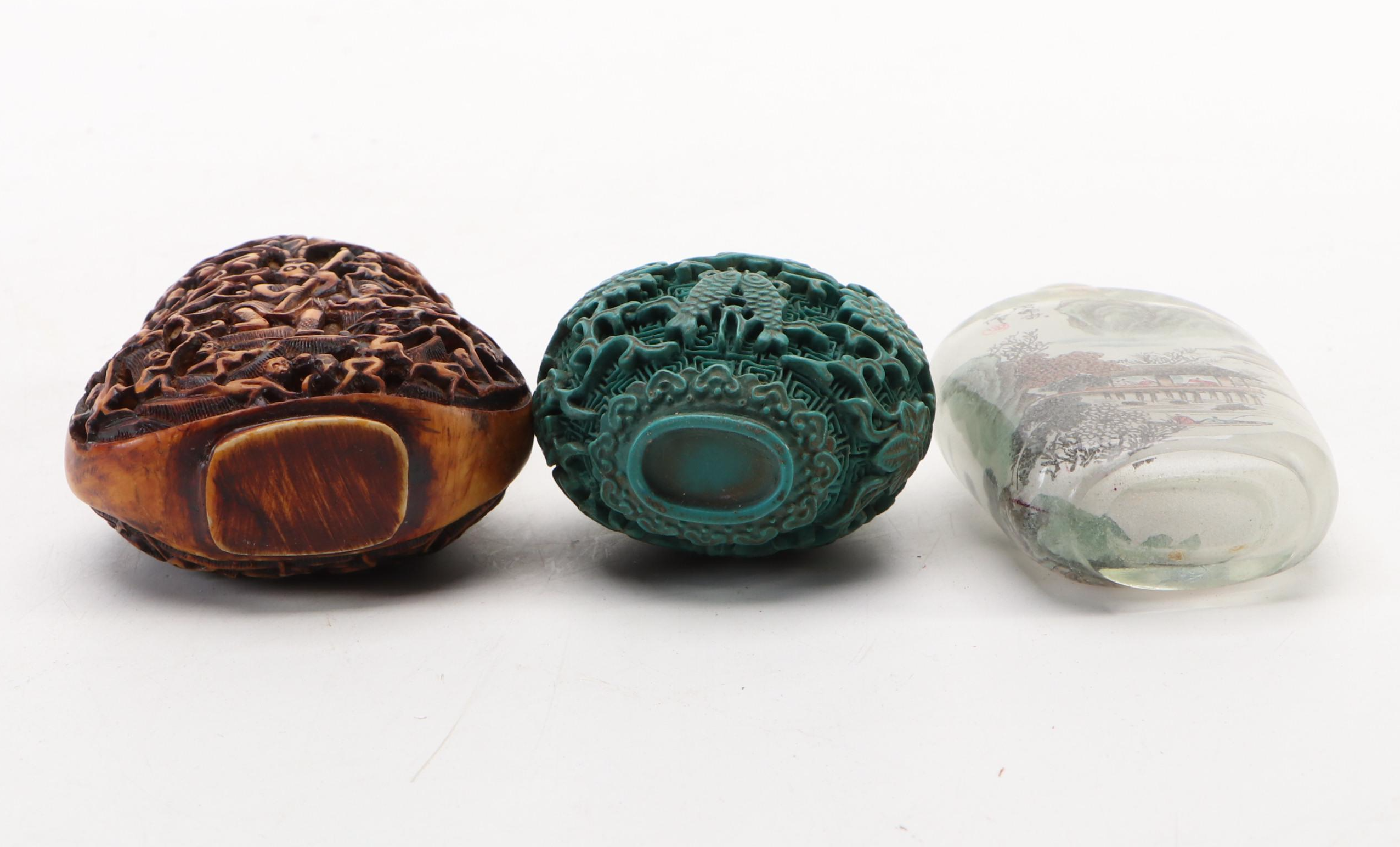 Chinese Reverse Painted Glass and Faux Cinnabar Style Carved Resin Snuff Bottles