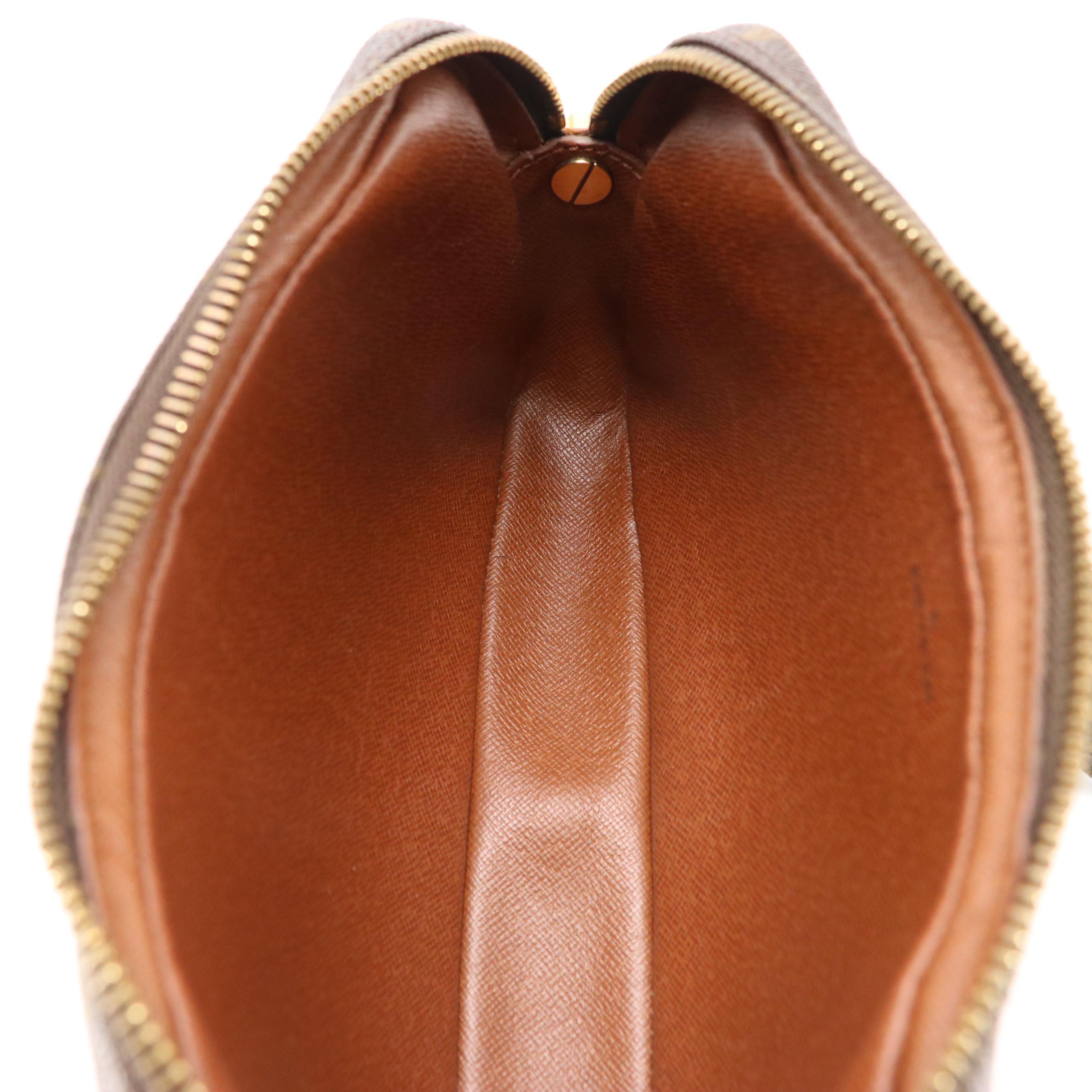 Louis Vuitton Marly Dragonne 22 Clutch in Monogram Canvas