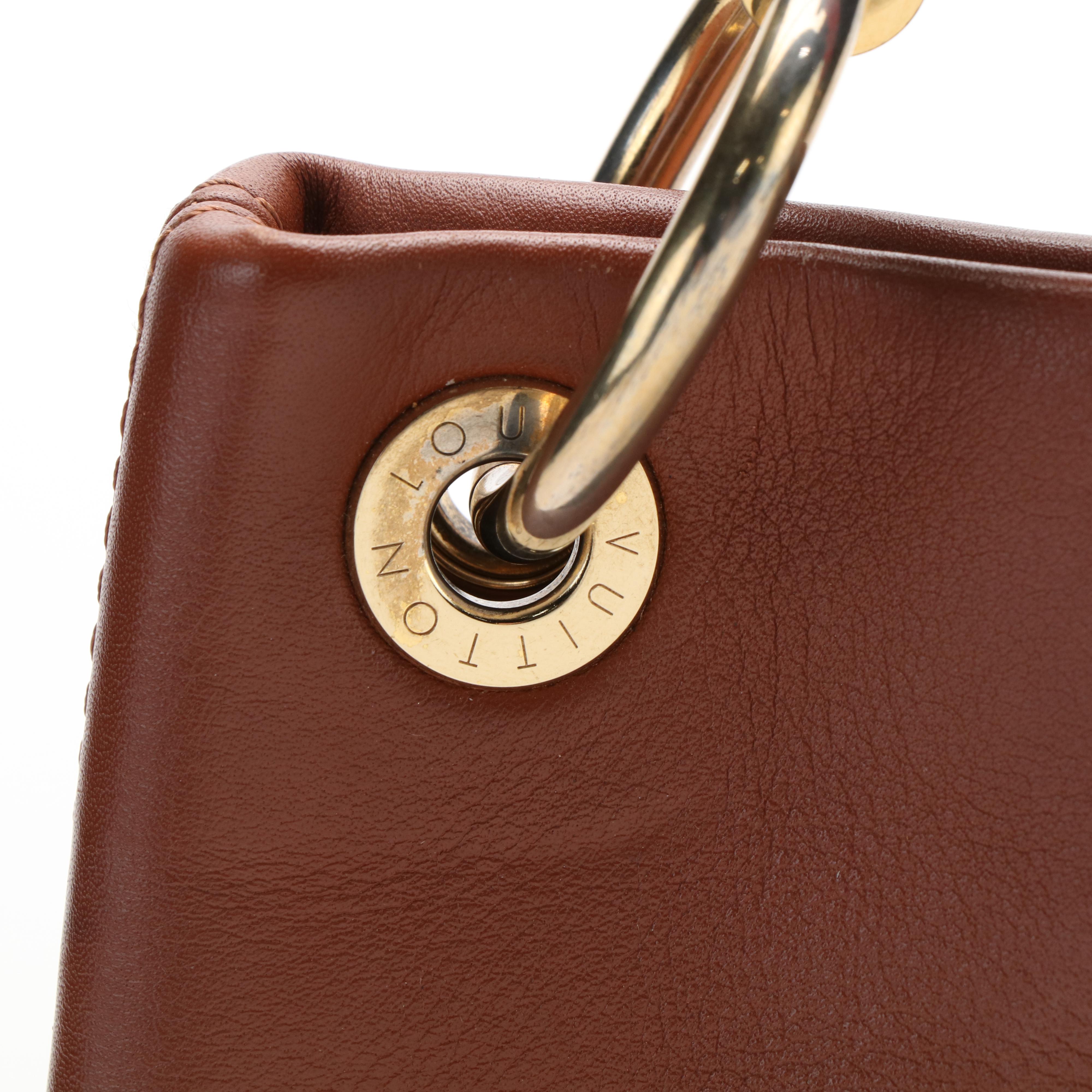 Louis Vuitton  Tuileries Besace Shoulder Bag in Monogram Canvas and Leather