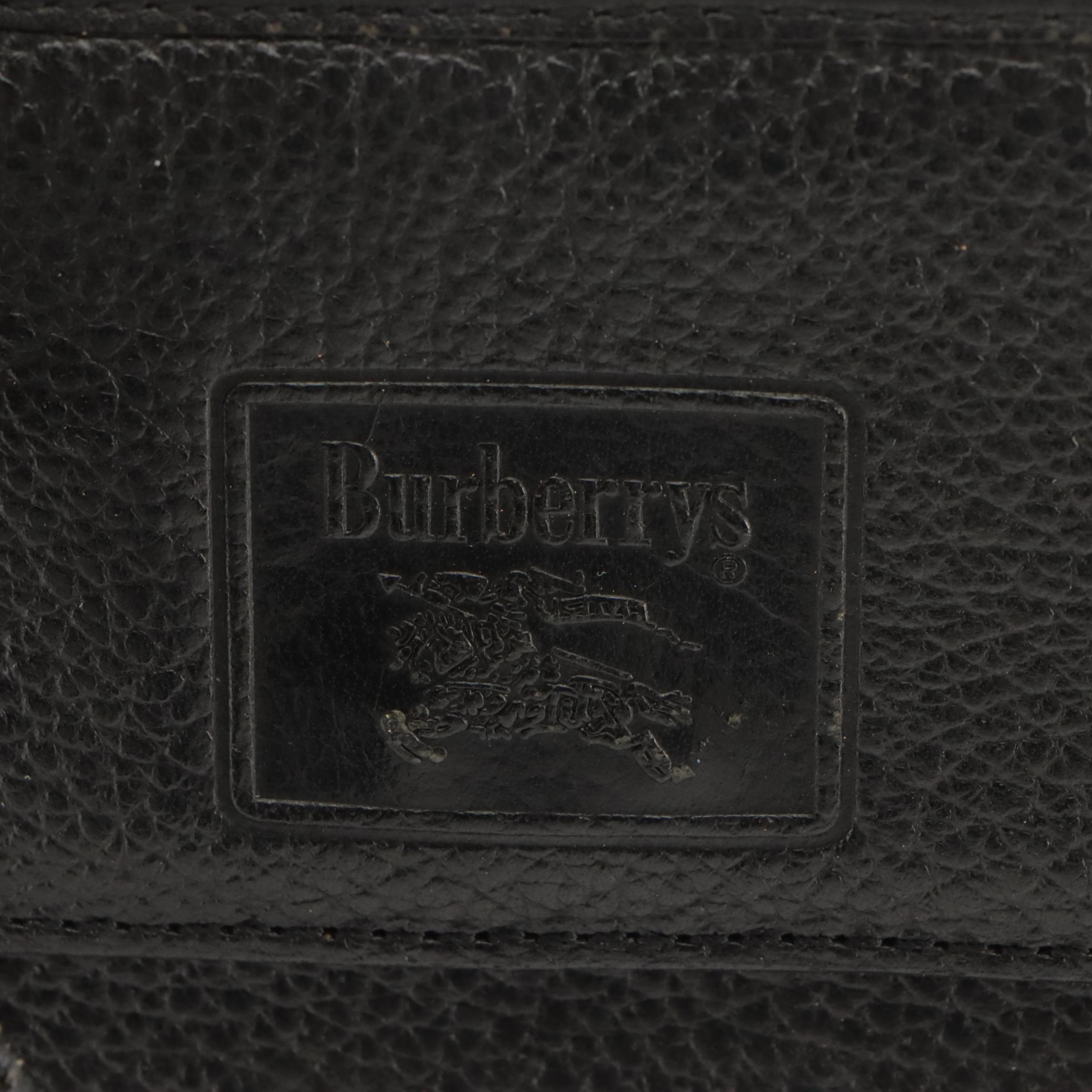 Burberrys Black Grain Leather Zip Clutch Wristlet with Haymarket Check Lining