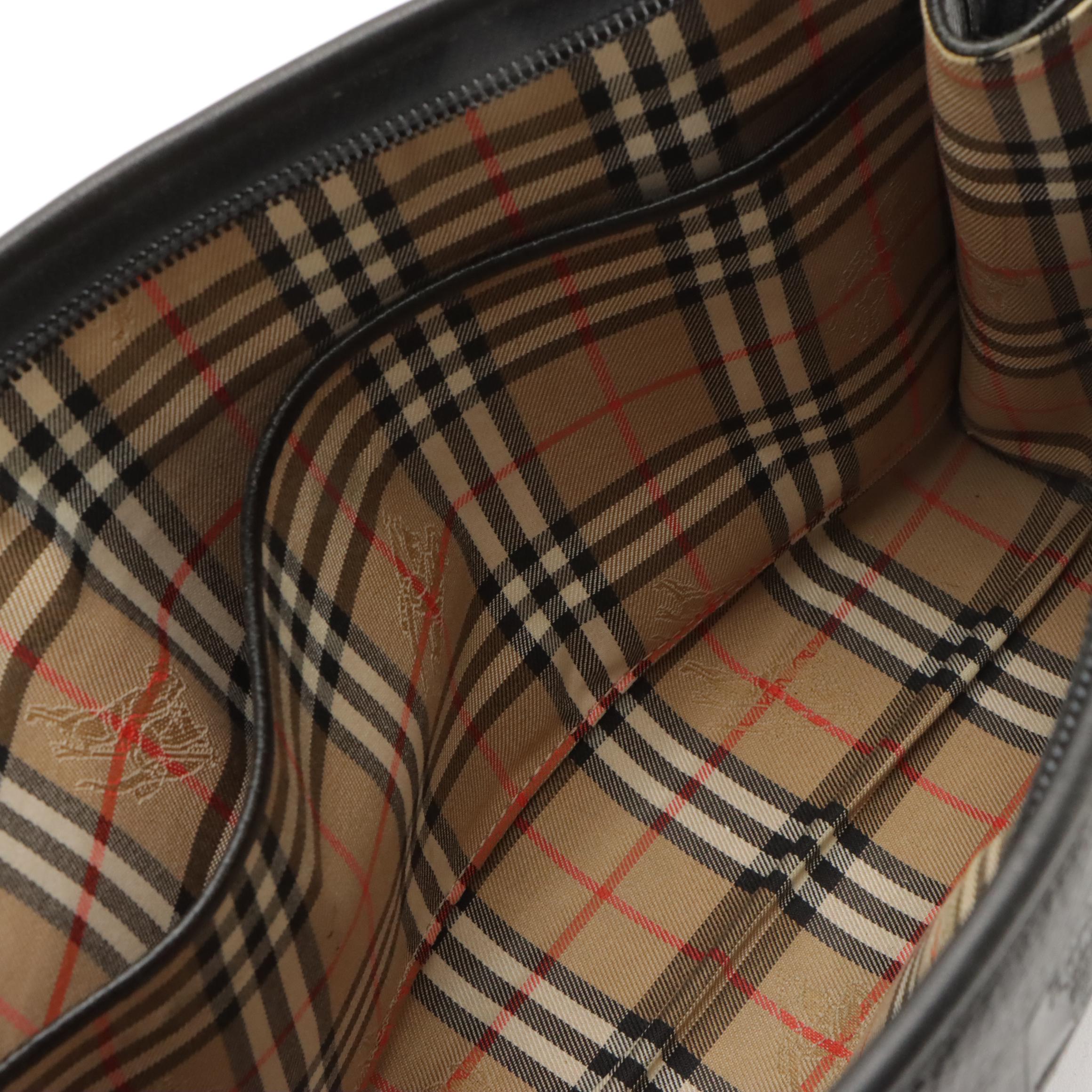 Burberrys Black Grain Leather Zip Clutch Wristlet with Haymarket Check Lining