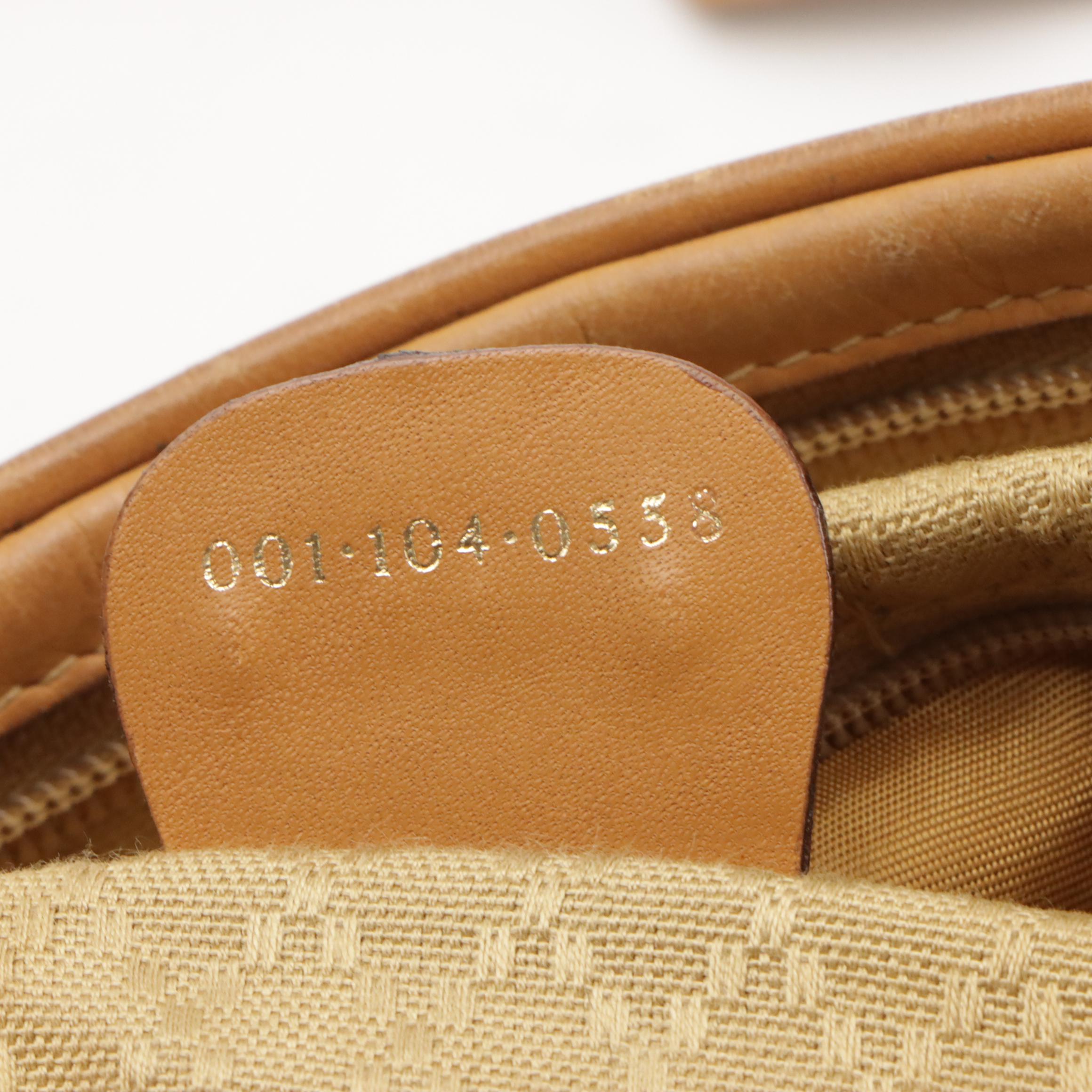 Gucci Zippered Crossbody Bag in Micro GG Supreme Canvas and Leather Trim